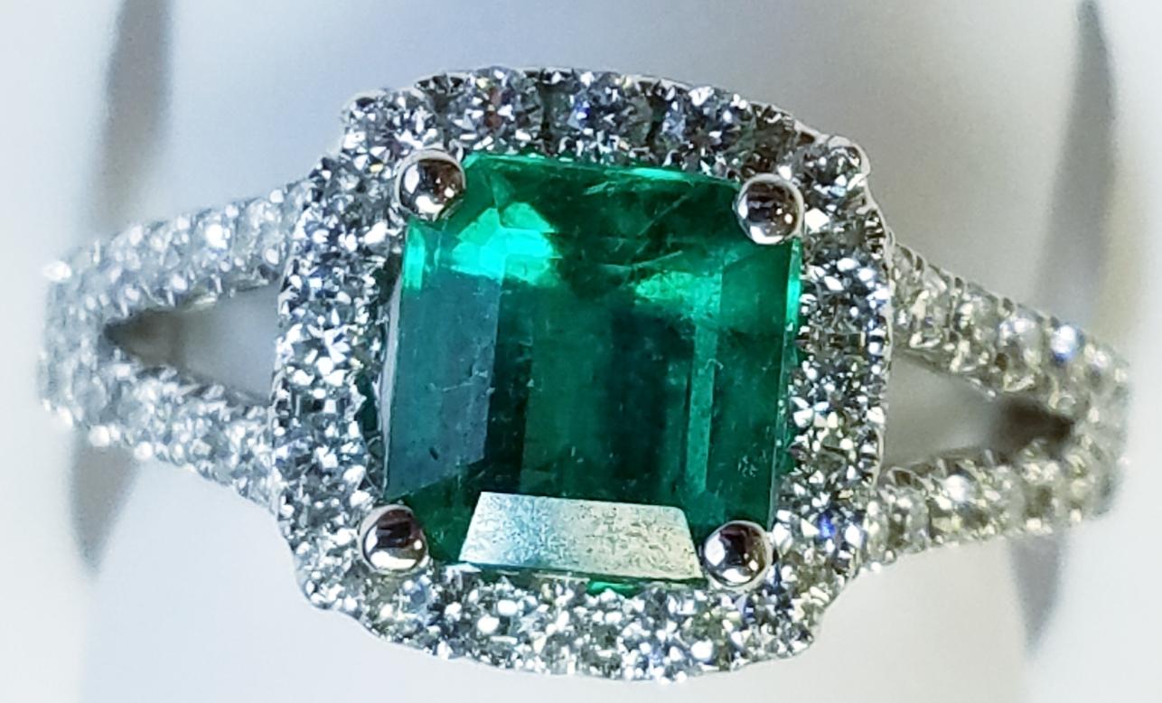 Women's 18 Karat White Gold Emerald Cut Emerald and Diamond Ring