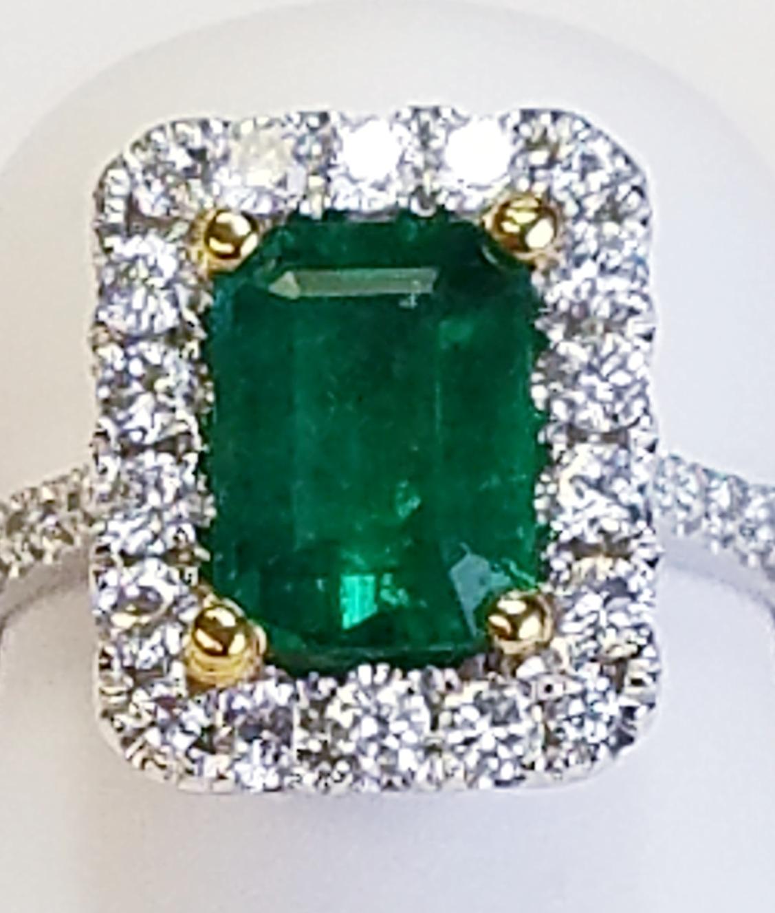 Women's or Men's 18 Karat White Gold Emerald Cut Emerald and Diamond Ring For Sale