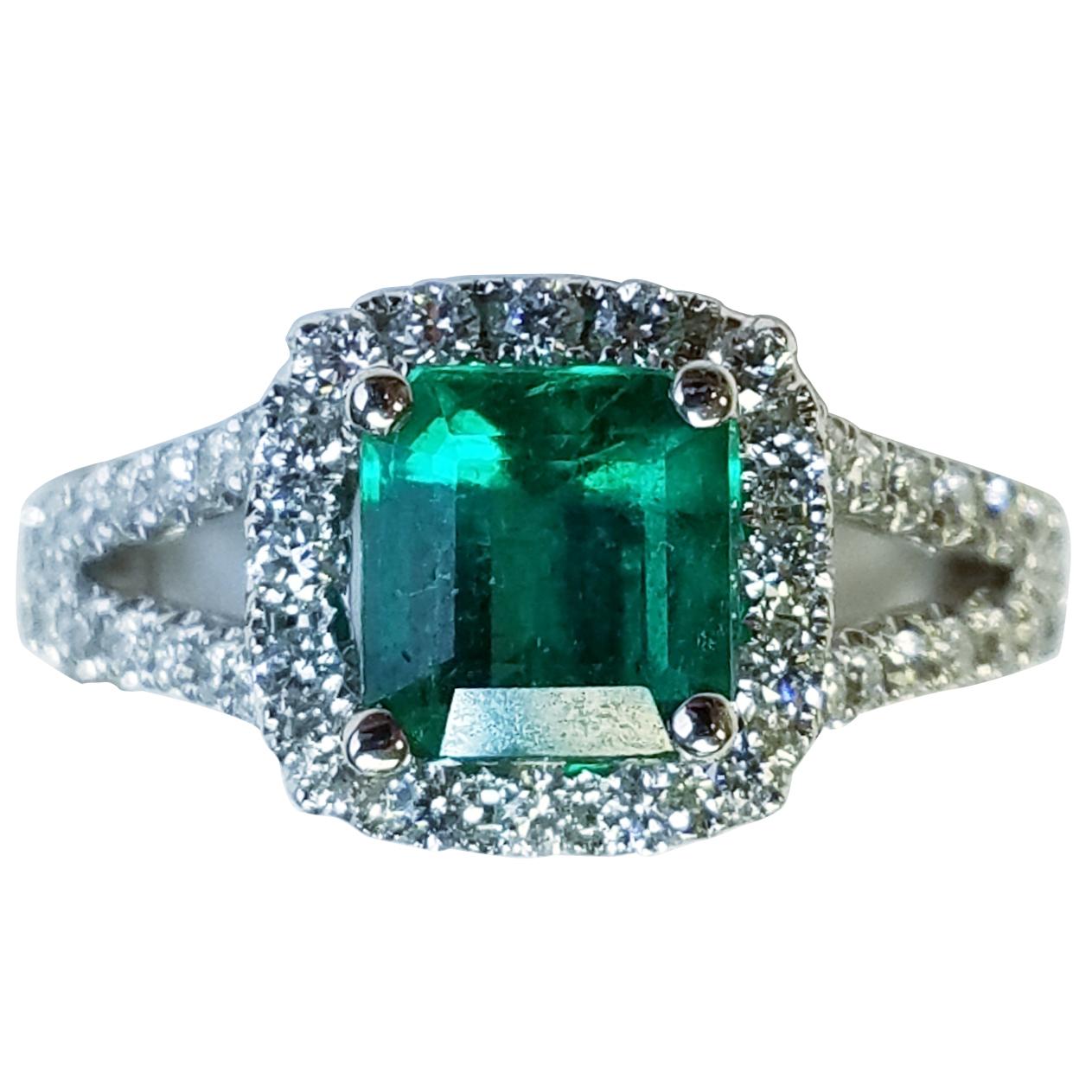 18 Karat White Gold Emerald Cut Emerald and Diamond Ring
