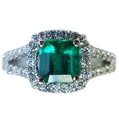 18 Karat White Gold Emerald Cut Emerald and Diamond Ring