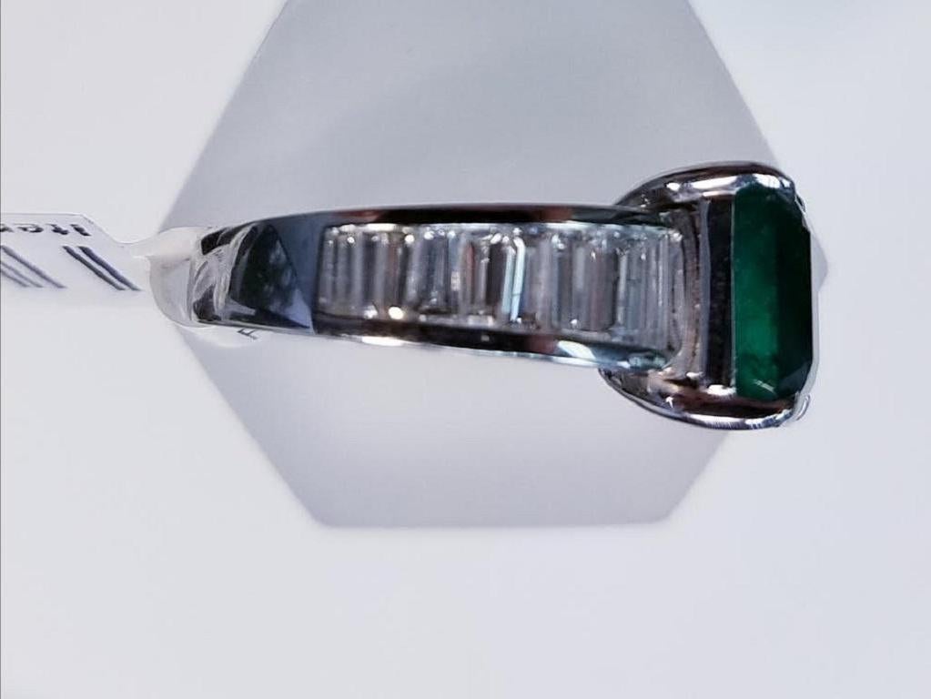 18 Karat White Gold Emerald Cut Emerald and Diamond Ring
3.79 Carats of Emeralds
1.37 Carats of Genuine Diamonds
Emerald Cut
18 Karat White Gold