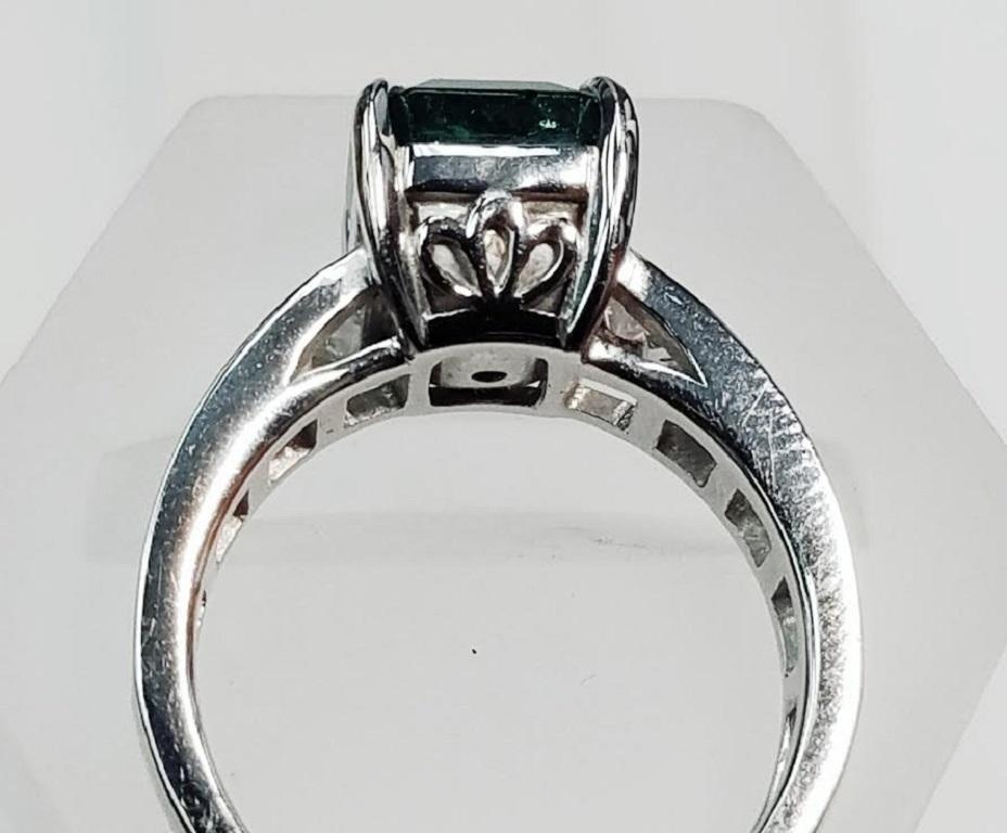Contemporary 18 Karat White Gold Emerald Cut Emerald and Genuine Diamond Ring