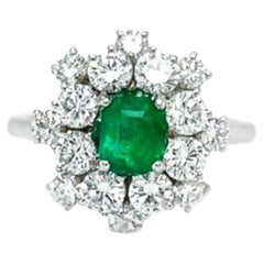 Used 18 Karat White Gold Emerald Cut Emerald Diamond Cocktail Ring
