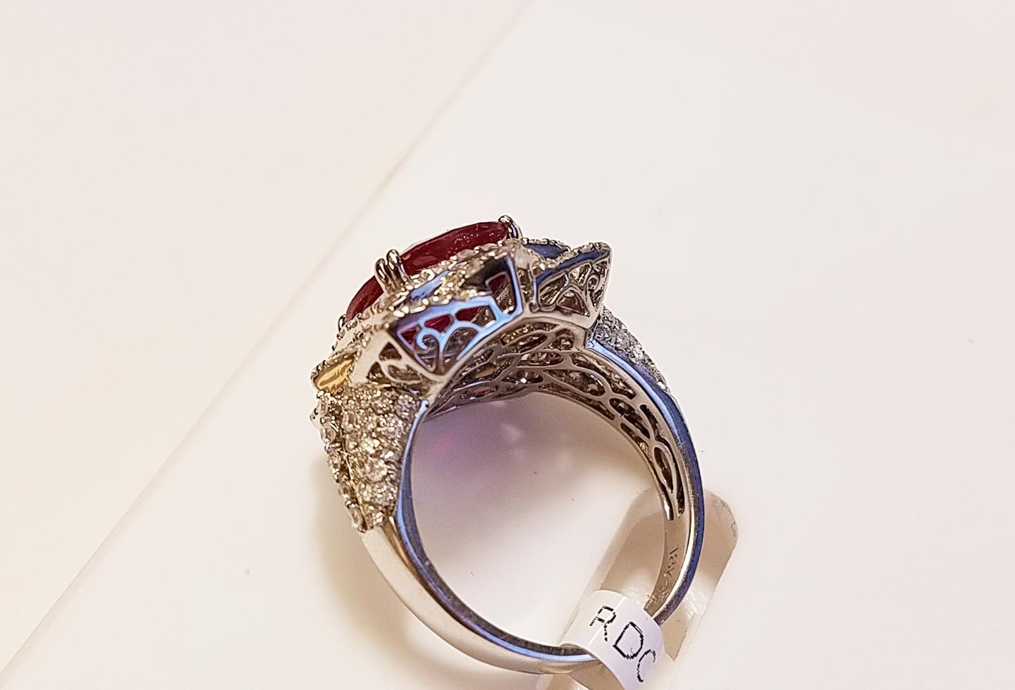 18 Karat White Gold Emerald Cut Ruby and Diamond Ring
4.39 Carats of Rubies
1.45 Carats of Diamonds 
Emerald Cut
18 Karat white gold 
