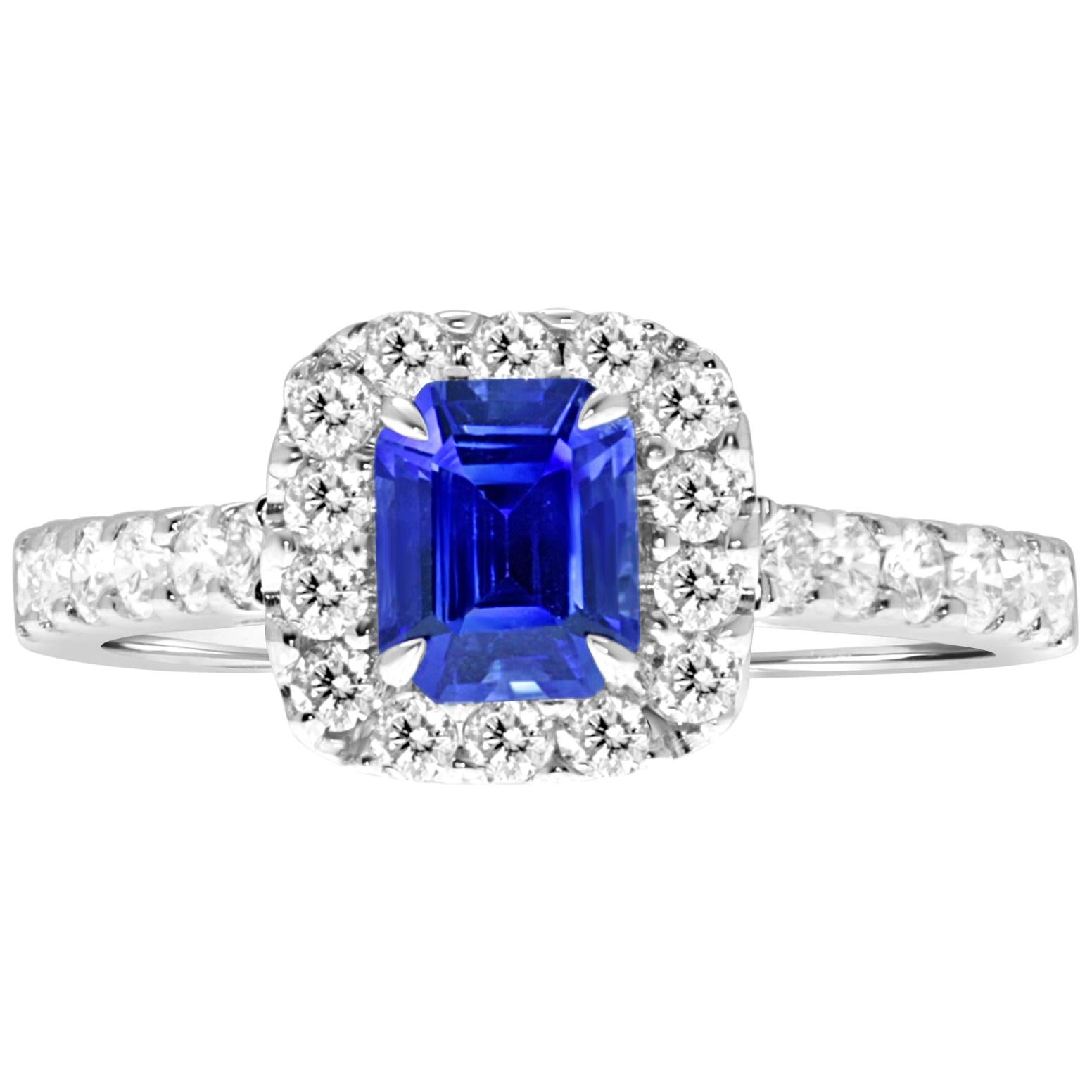 18 Karat White Gold Emerald Cut Sapphire Halo Diamond Engagement Ring For Sale