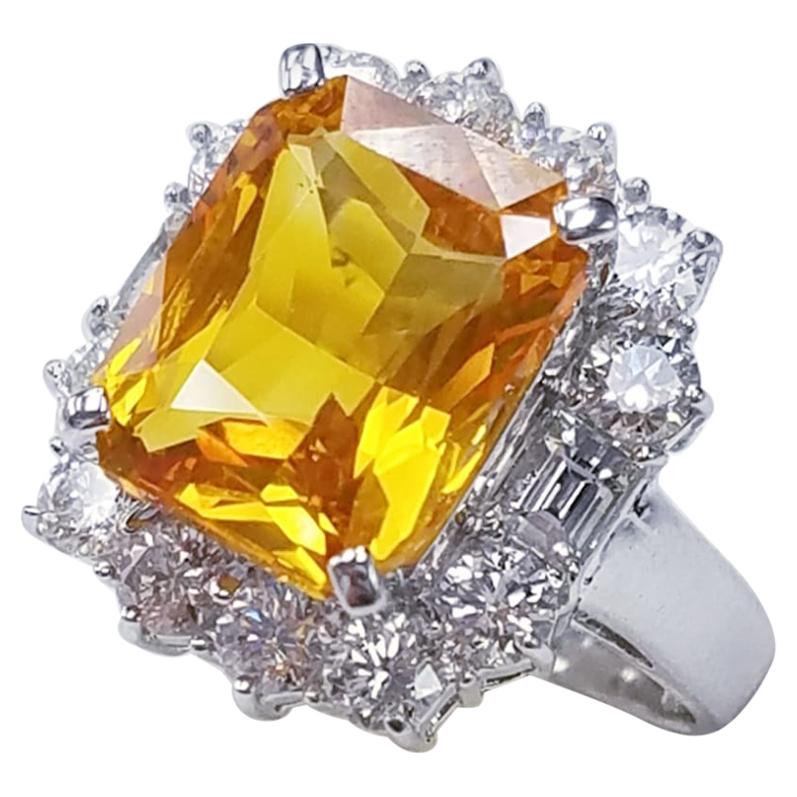 18 Karat White Gold Emerald Cut Yellow Sapphire and Diamond Ring
7.08 Carats of Yellow Sapphires
1.34 Carats of Diamonds
Emerald Cut
18 Karat White Gold