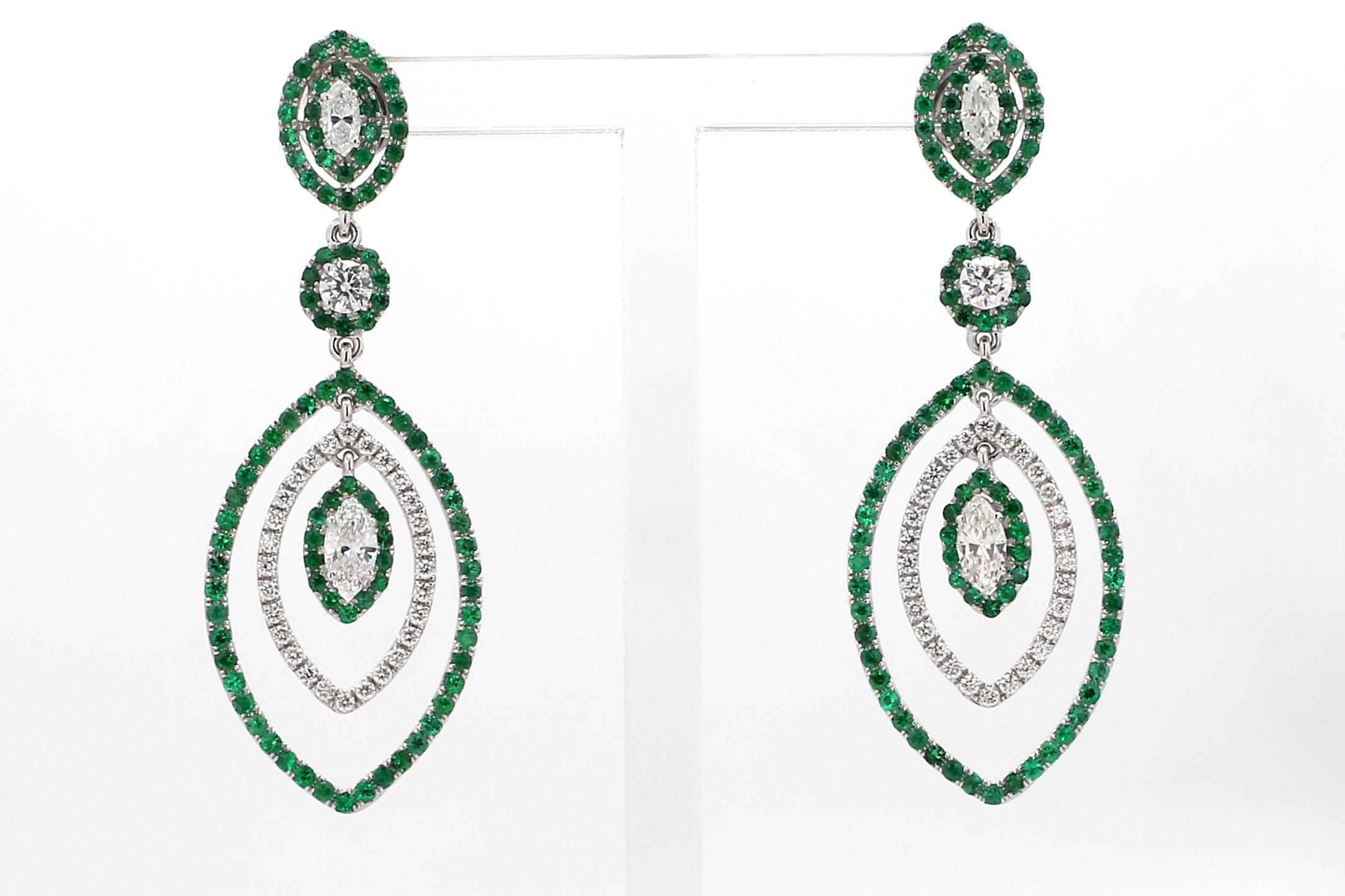 A Beautiful Handcrafted Marquise Shape Earring in 18 karat White Gold with Natural Brilliant Cut Colorless Diamond And Zambian Mined Emerald. A Statement piece for Evening Wear

Natural Diamond Details
Pieces : 62 Pieces
Weight : 1.48 Carat 
Clarity