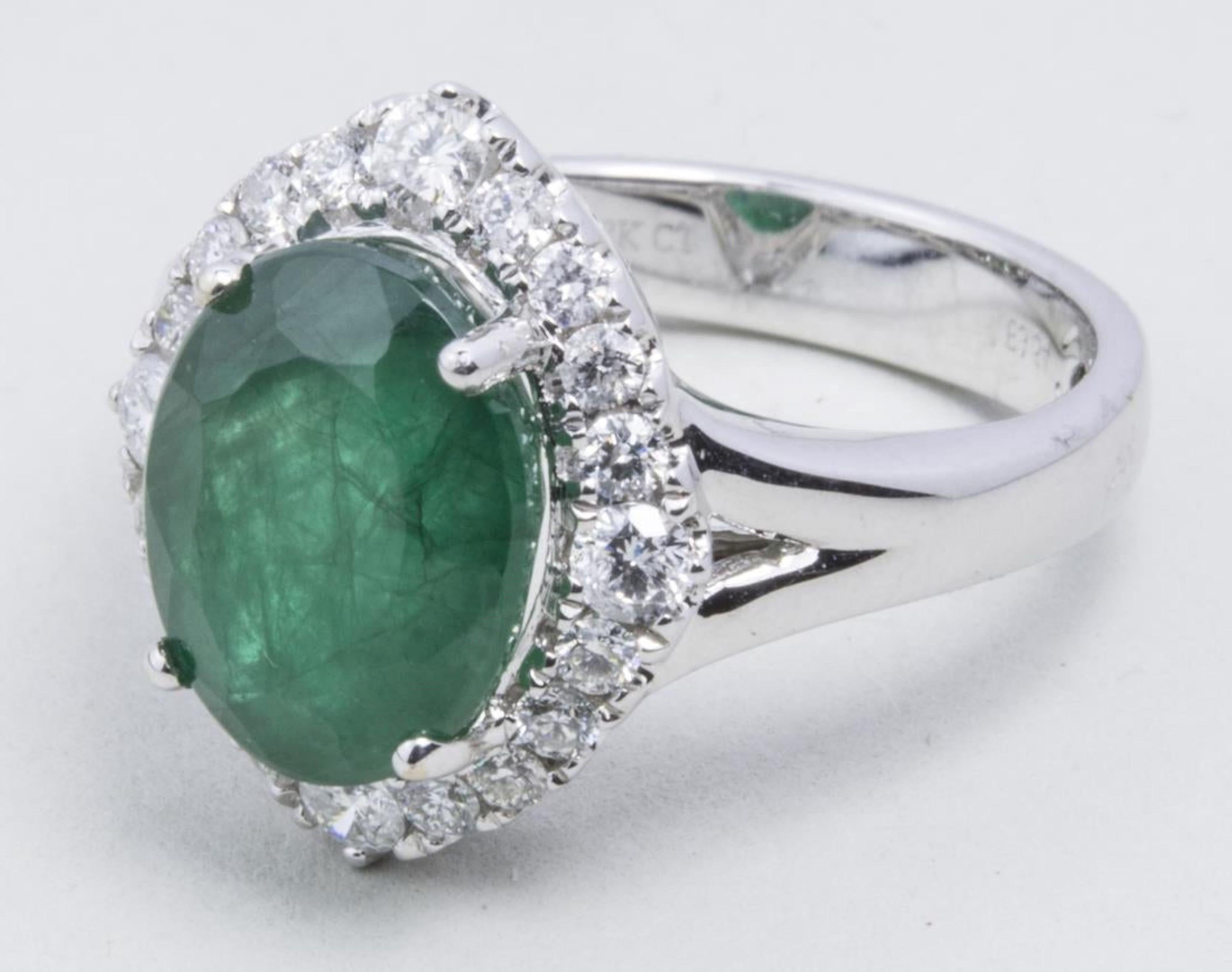 Oval Cut 18 Karat White Gold Emerald Fashion Ring For Sale