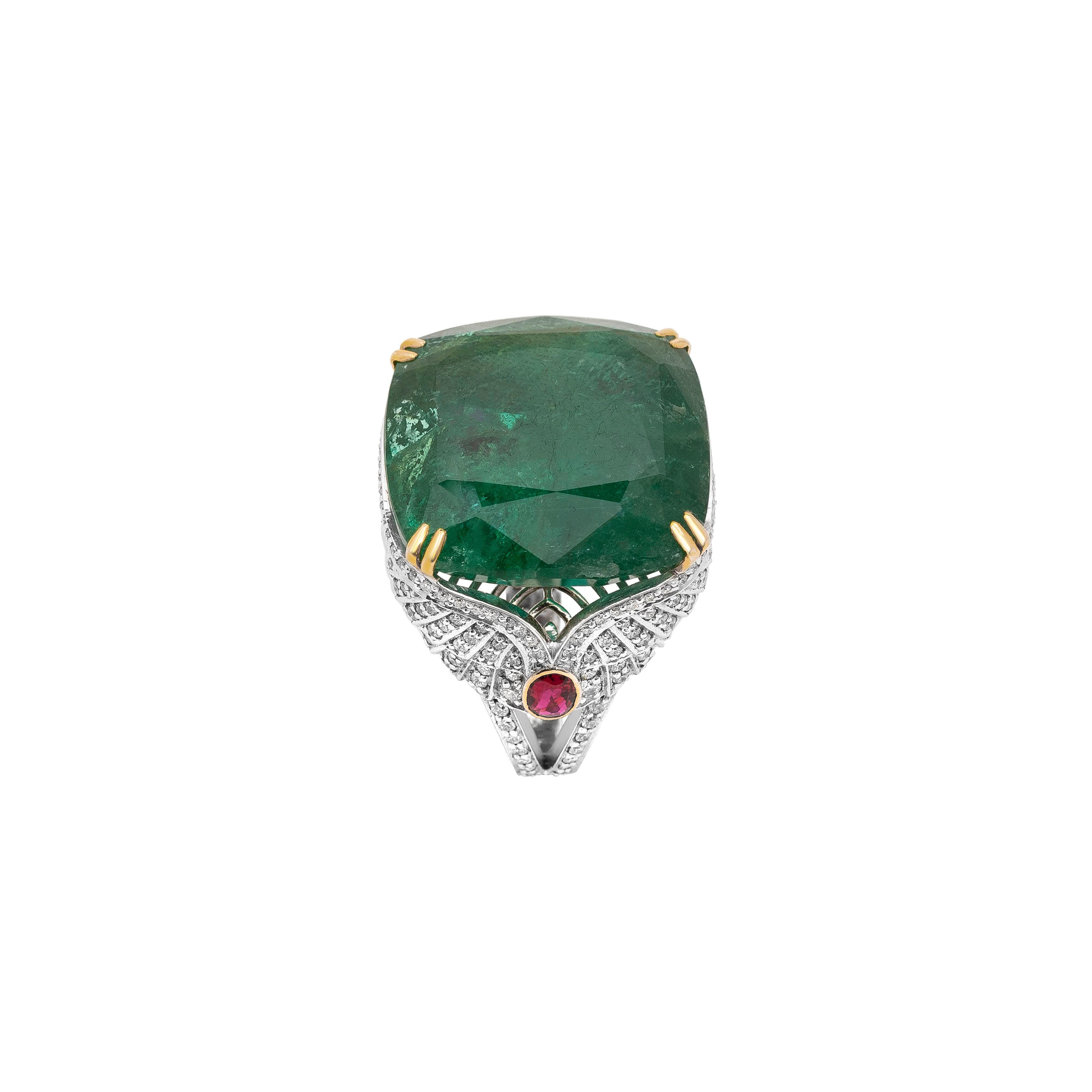 18 Karat White Gold Emerald Ruby And Diamond Cocktail Ring

Beautiful emerald cocktail ring flanked by rubies & accentuated by white diamonds set in 18kt white gold.  
Emerald - 37.77cts
Ruby - 0.82cts
Diamonds - 1.41cts

Ring Size - US Size