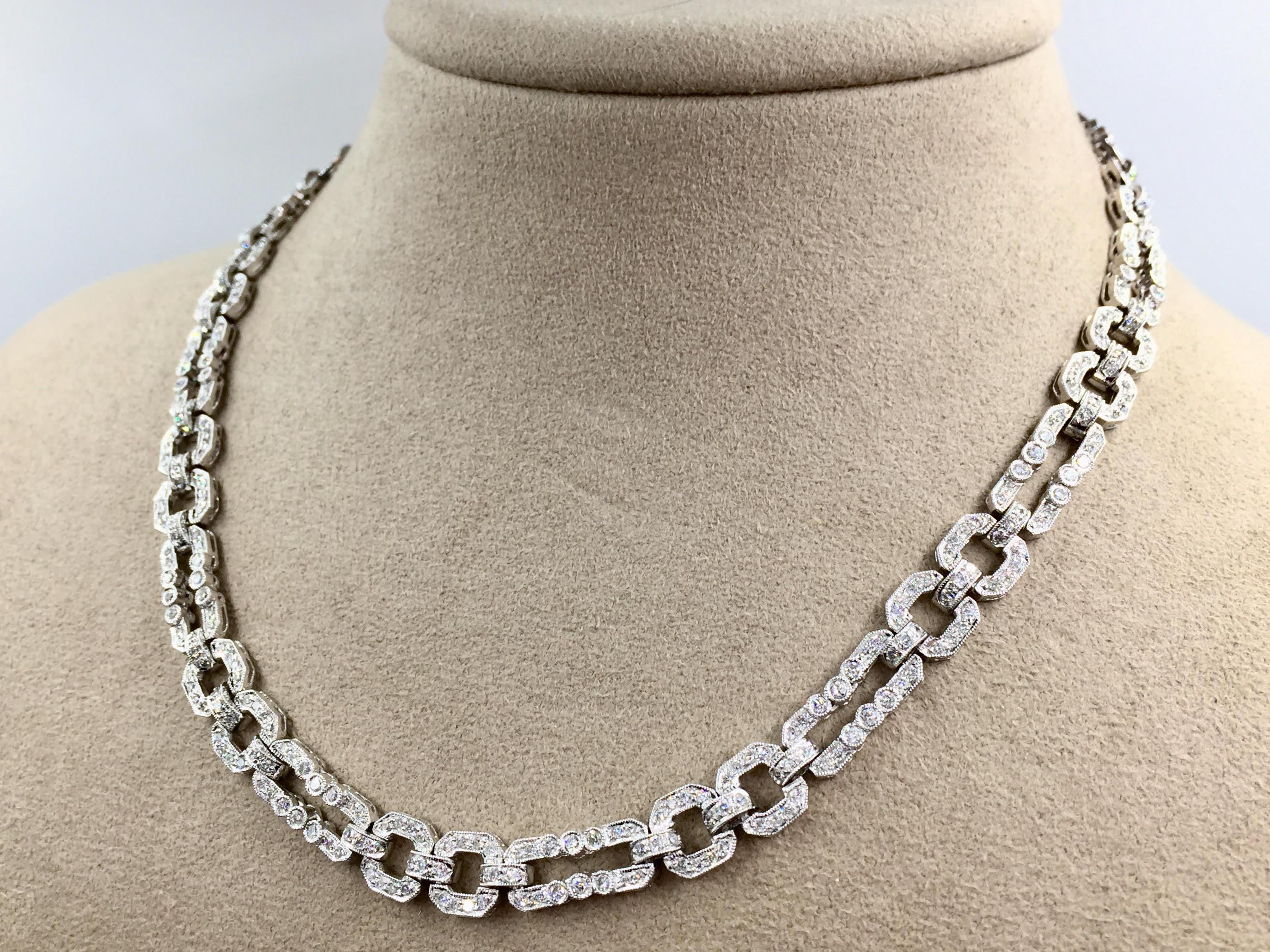 This beautiful retro 18k white gold diamond link necklace is made with fine craftsmanship and attention to detail including delicate beading all along the edges of each link and an estimated 5.00 carats total weight of round brilliant diamonds.