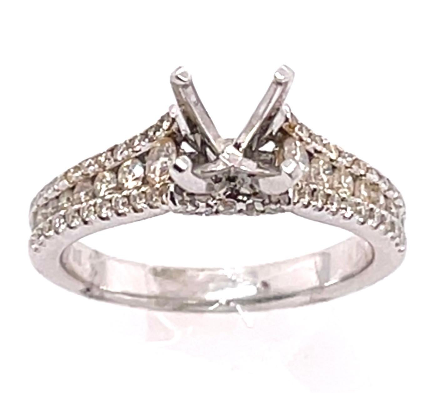 18 Karat White Gold Engagement Ring Setting With Three Tier Accent Diamond Band
Size 6.75
0.68 total diamond weight.
5.1 grams total weight.