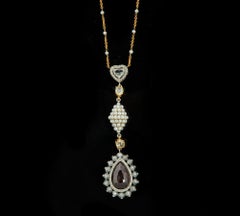 18 Karat White Gold Envy Necklace with 12.3 Carats Red Faceted Opaque Diamonds