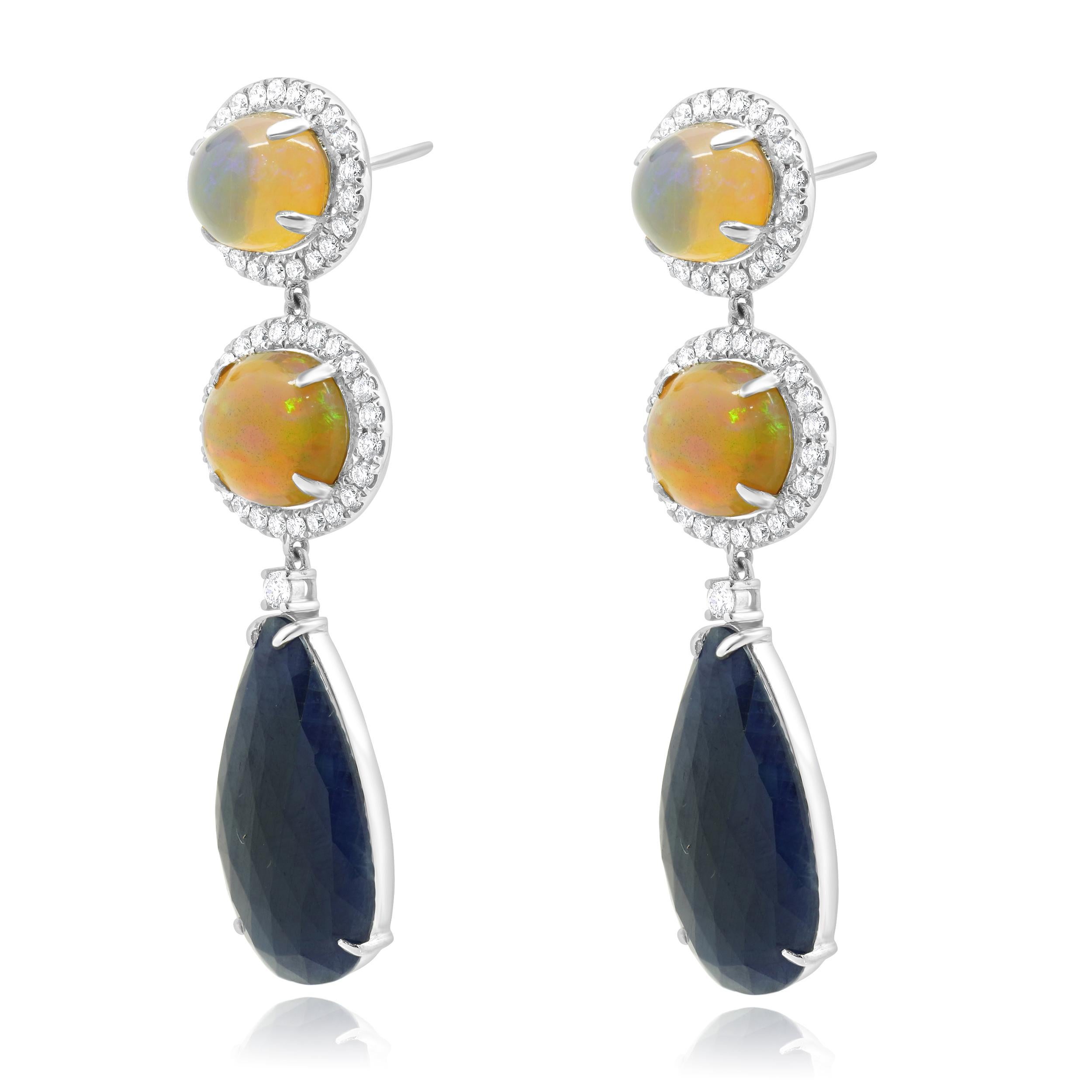 Designer: kundenspezifisch
MATERIAL: 18K Weißgold
Äthiopischer Opal: 4 Cabochon-Schliff = 9,75cttw
Saphir: 2 Birnenschliff = 10,80cttw
Diamant: 94 runder Brillantschliff = 0,95cttw
Farbe: G
Klarheit: SI1-2
Gewicht: 15.40 Gramm