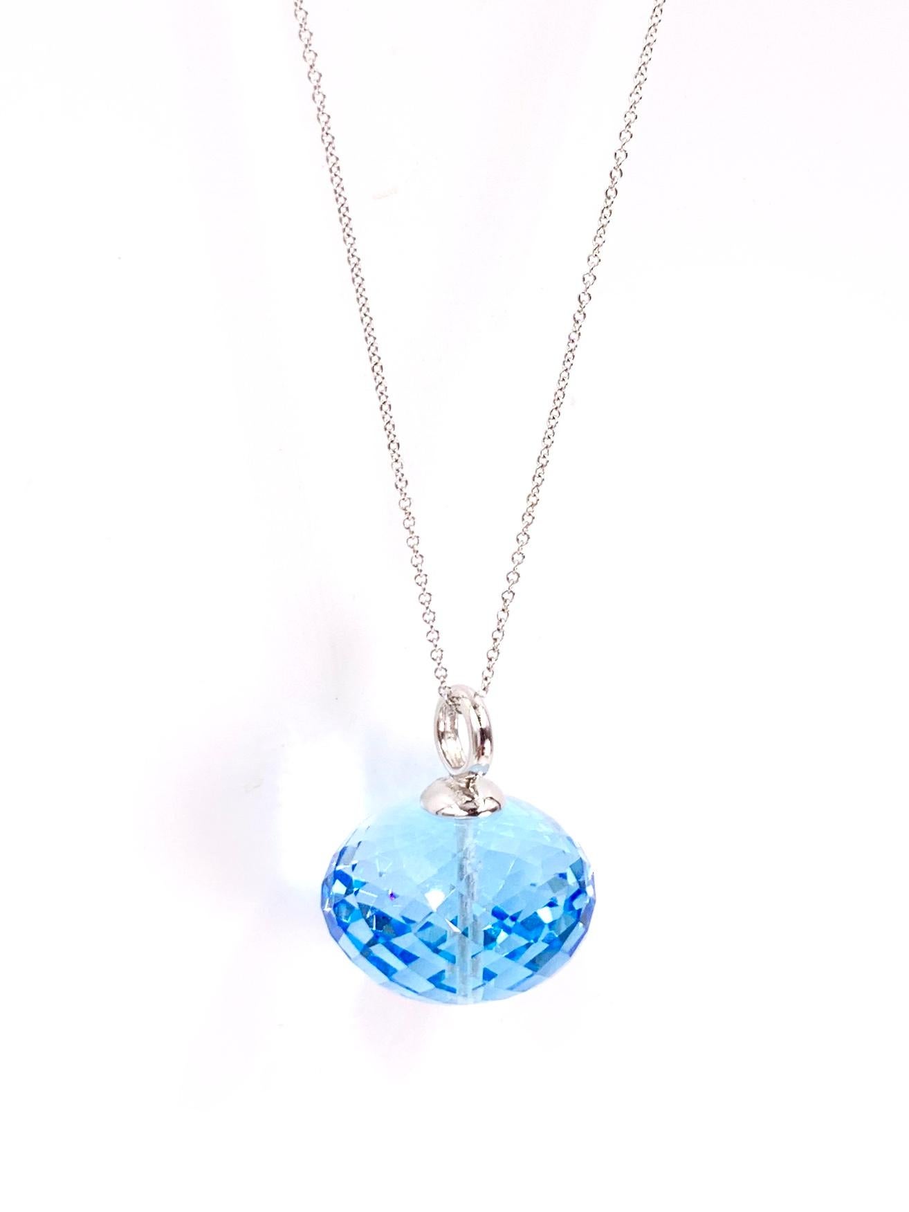 Exclusively by fine fashion jewelry designer, Goshwara. From the uniquely beautiful 'Beyond' collection is a stunning 18mm x 12mm faceted blue topaz pendant on a delicate 18 karat white gold 16