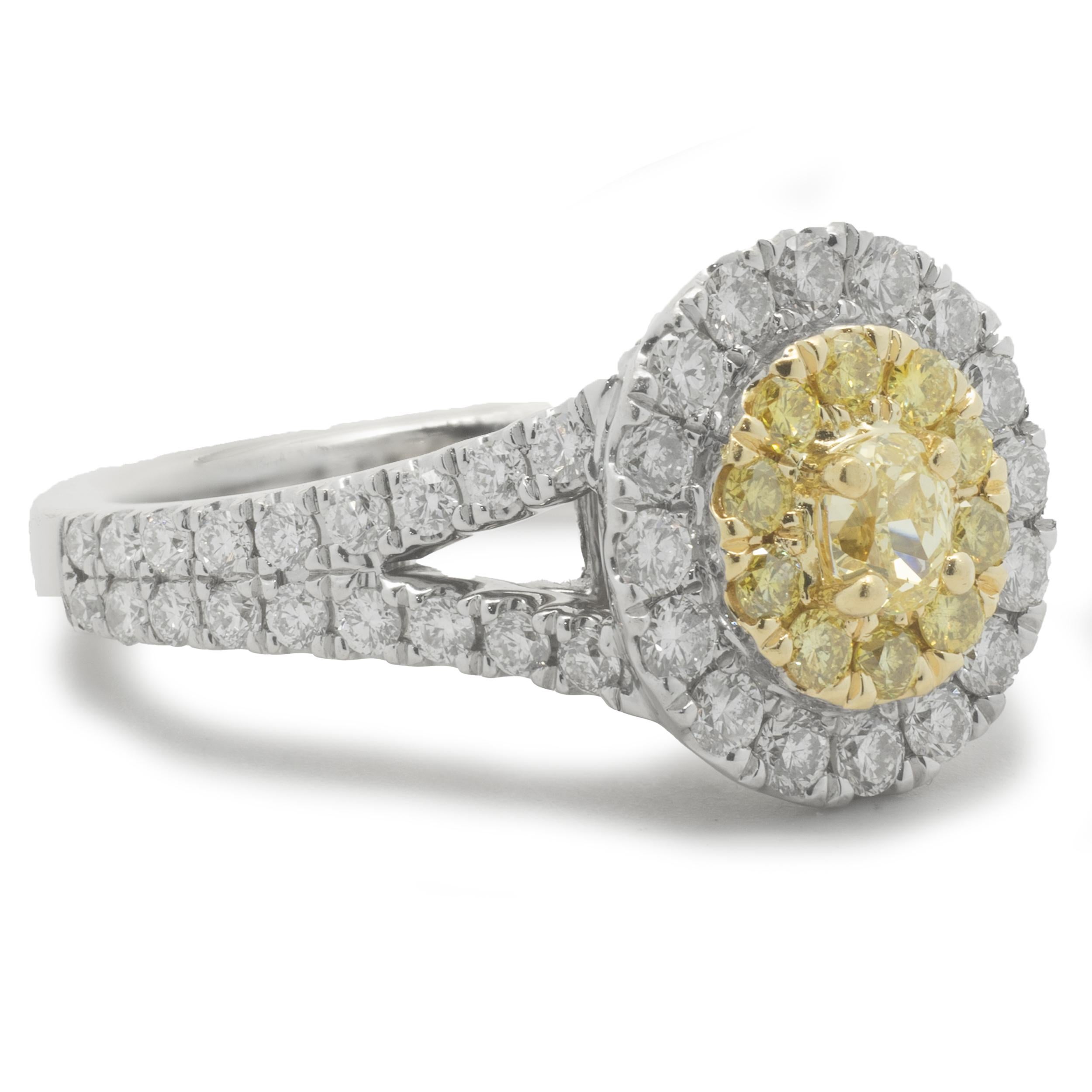 Designer: custom
Material: 18K white gold
Diamond: 11 round brilliant cut = .30cttw
Color: Fancy Yellow
Clarity: SI1
Diamond: 52 round brilliant cut = .78cttw
Color: G
Clarity: SI1
Ring Size: 5.25 (please allow up to 2 additional business days for