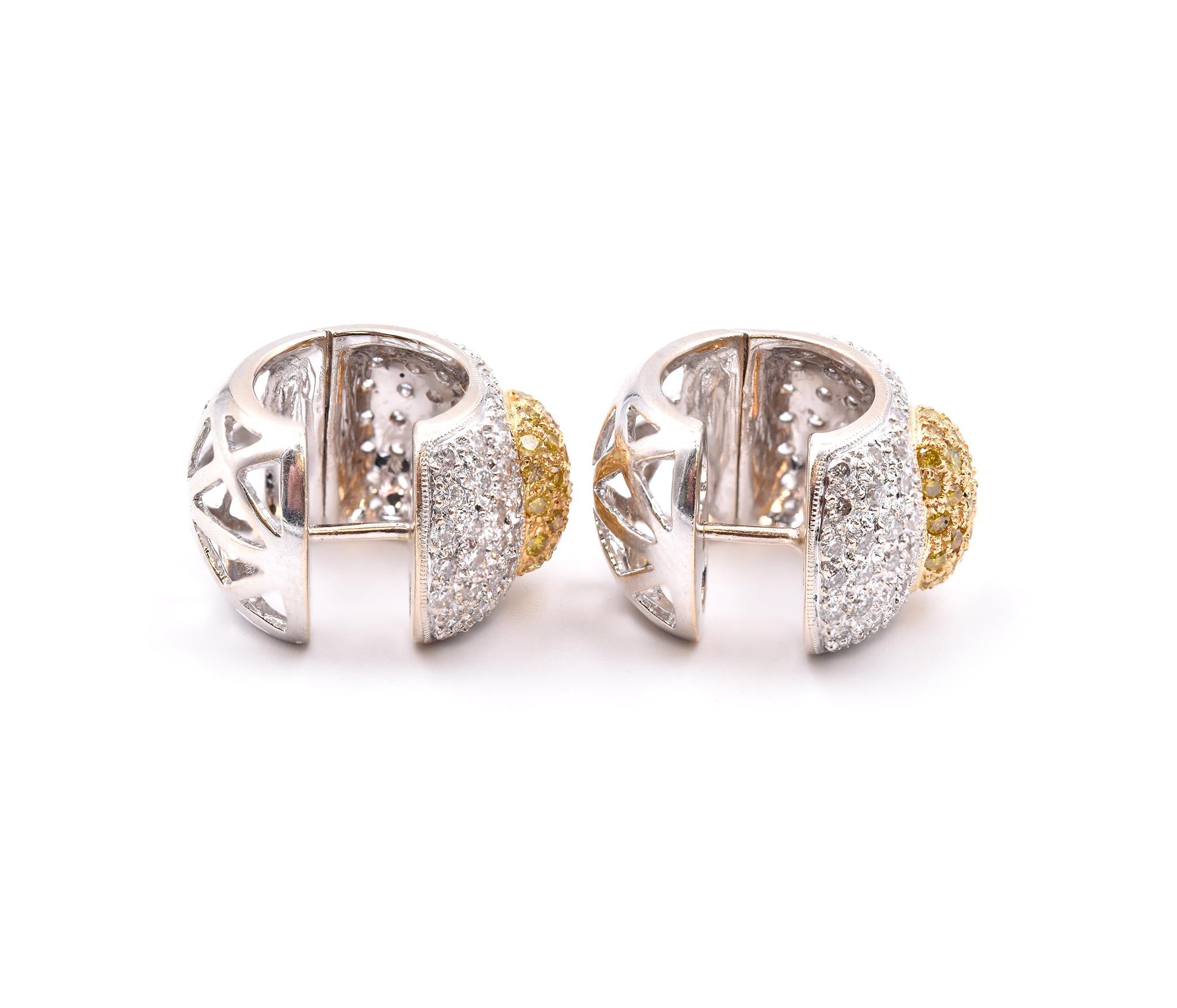 Material: 18K white gold
Diamonds: 118 round cut = 1.75cttw
Color: H
Clarity: SI1
Diamonds: 68 round cut = 1.02cttw
Color: Fancy Yellow 
Dimensions: earrings measure 18.4mm X 12.7mm
Fastenings: snap closure
Weight: 16.91 grams