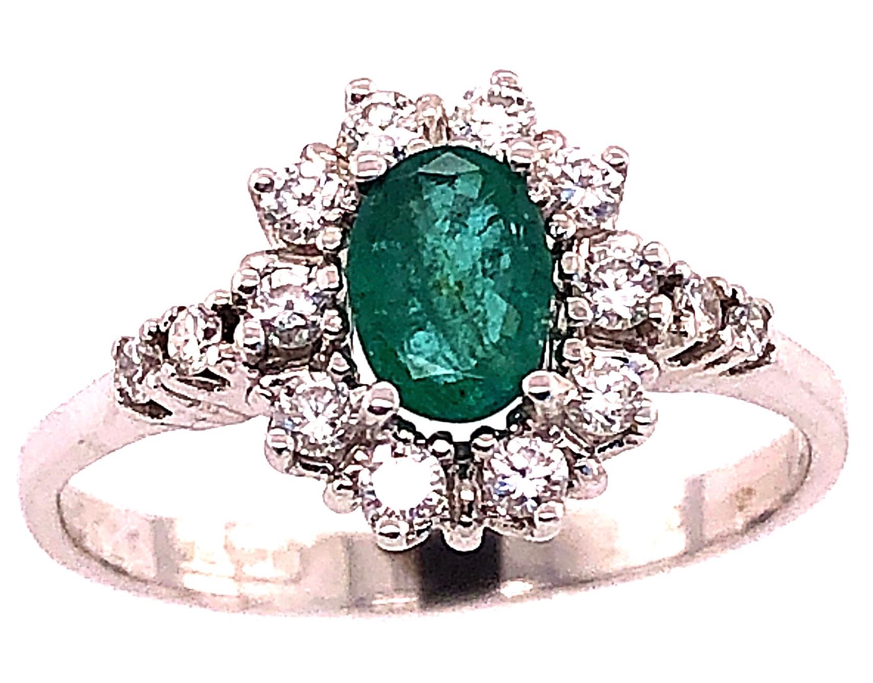 18 Karat White Gold Fashion Wempe Emerald and Diamond Ring Size 5.25.
0.75 total diamond weight.
2.20 grams total weight.
9.66 ring height.
 Wempe Stamped.
This item is resizable however we do not provide this service. 
