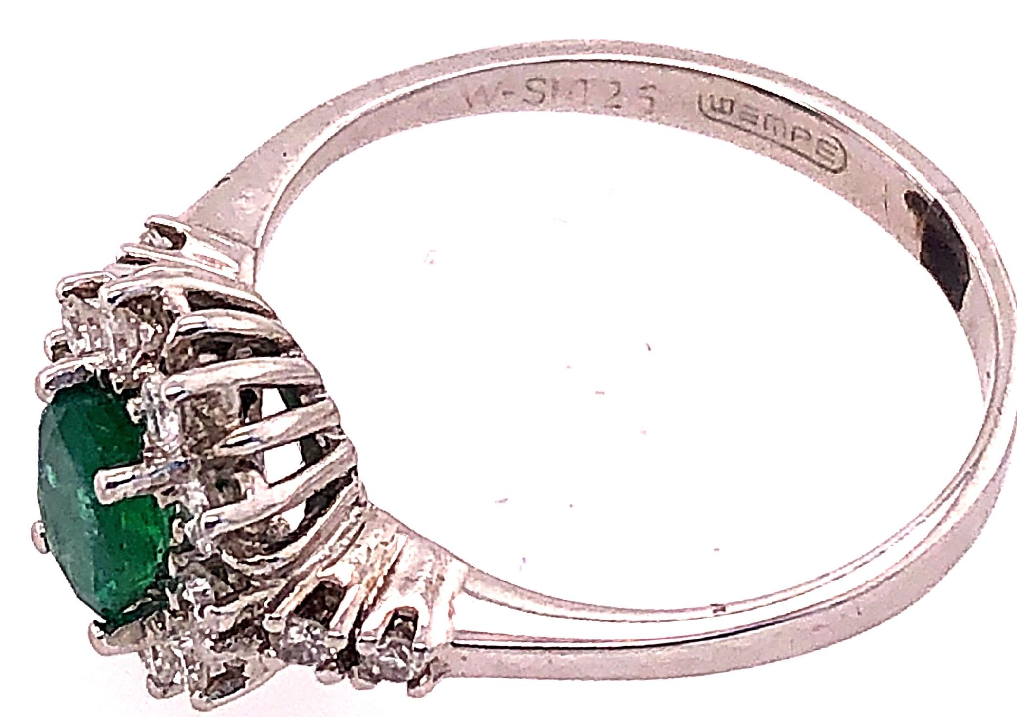 Oval Cut 18 Karat White Gold Fashion Wempe Emerald and Diamond Ring For Sale