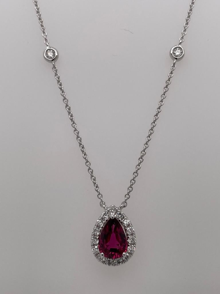 Pear shape Ruby weighing 0.69 cts
Diamonds weighing .25 cts
Set in 18K white gold
