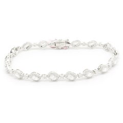 Bracelet en or blanc 18 carats avec diamants en forme de flamme