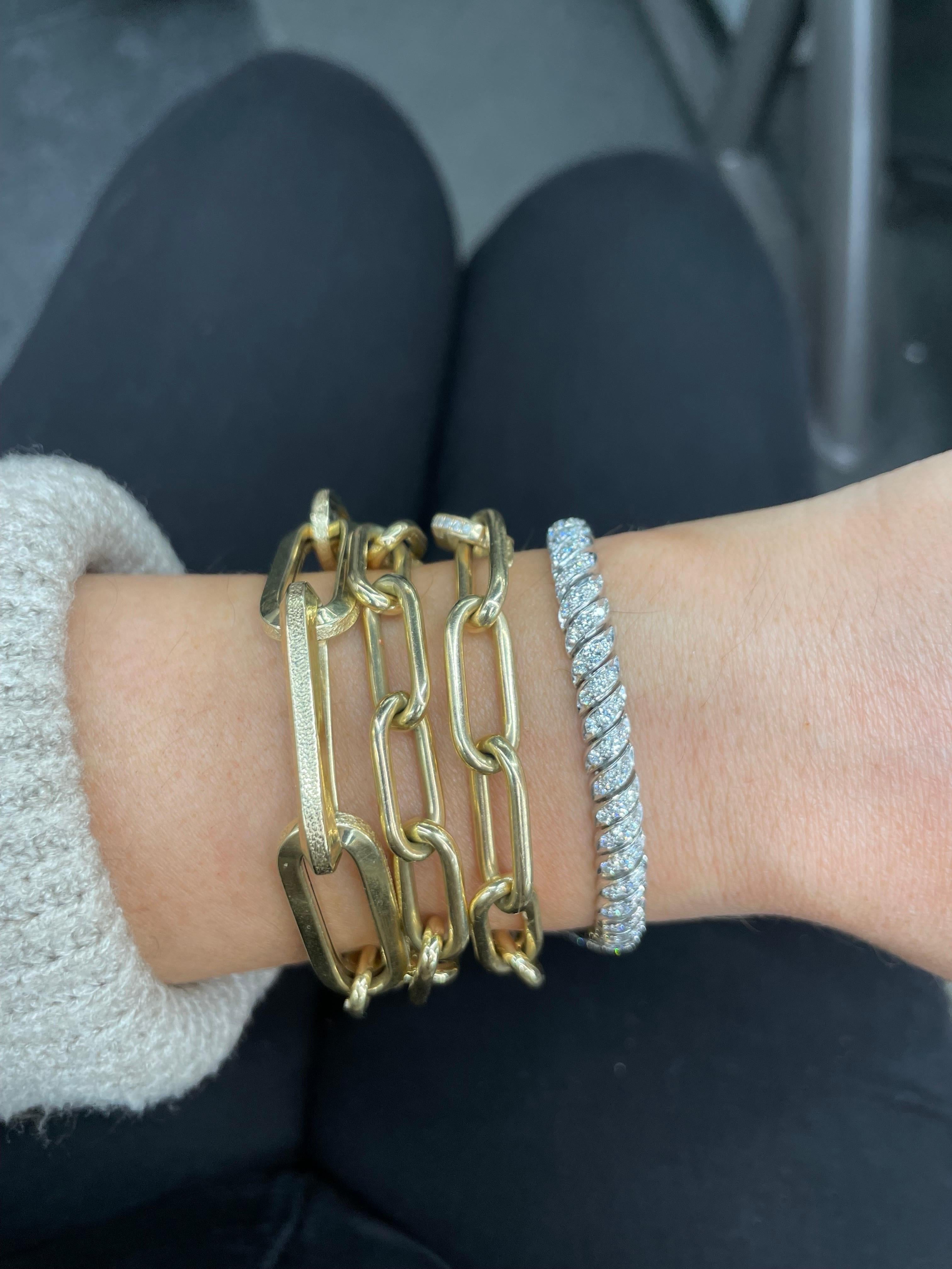 Vintage 18 Karat White Gold flexible bracelet featuring 147 round brilliants weighing approximately 3 carats.