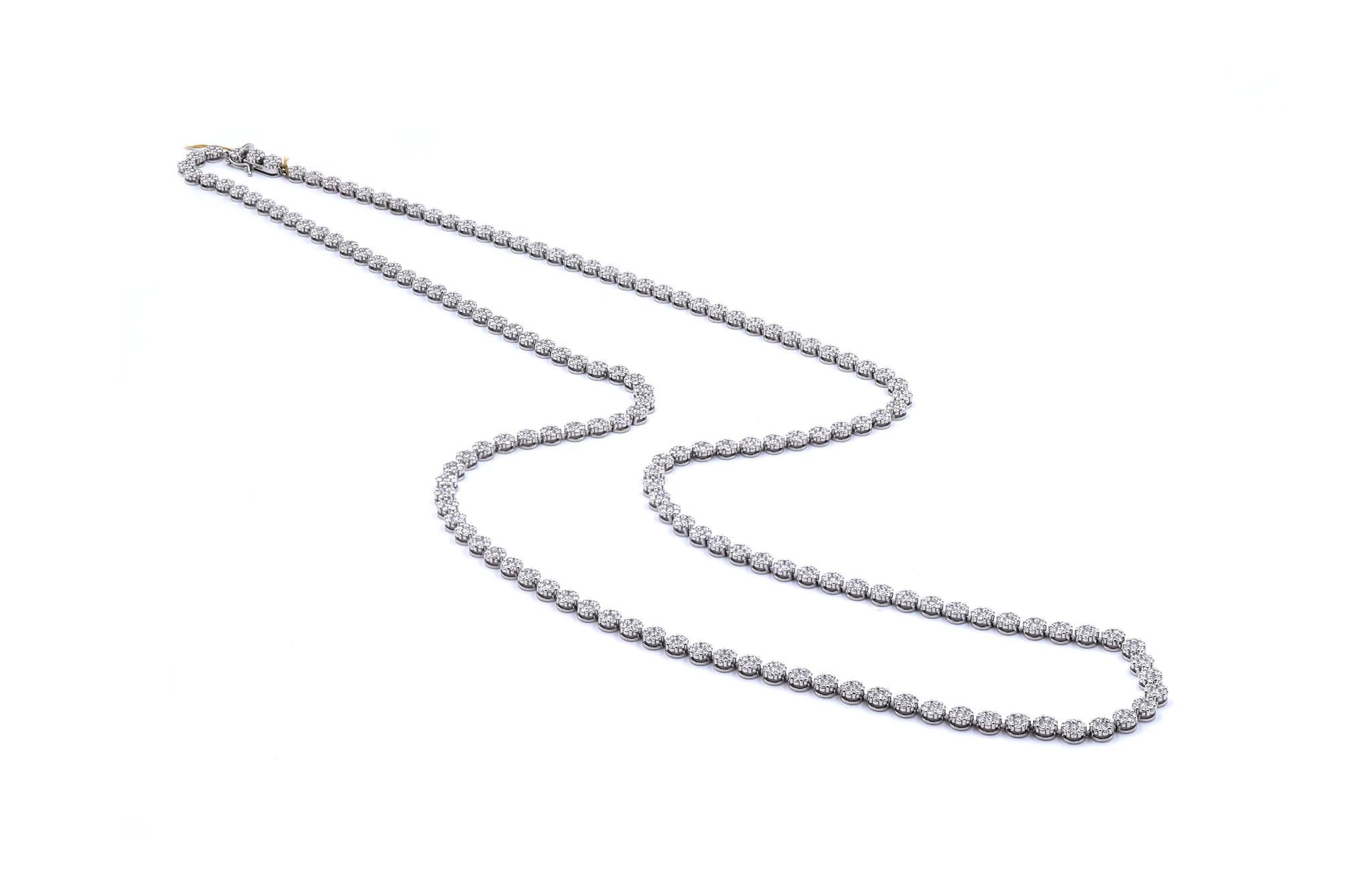 Designer: custom
Material: 18K white gold
Diamonds: 110 round cut =27.36cttw
Color: G
Clarity: VS
Dimensions: necklace measures 38-inches in length
Weight: 61.57 grams

