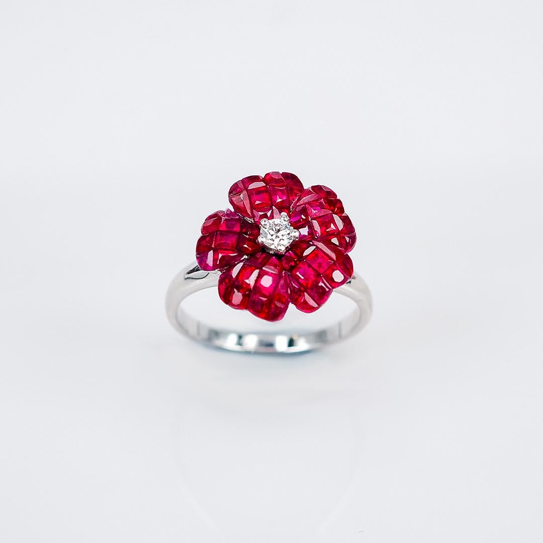 A very nice Ruby ring use the top quality Ruby which make in invisible setting. We set the stone in perfection as we are professional in this kind of setting more than 40 years. The invisible is a highly technique .We cut and groove every stone.