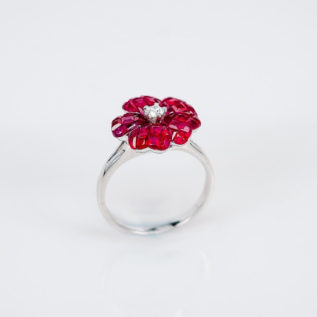 Modern 18 Karat White Gold Flower Invisible Ruby Ring For Sale