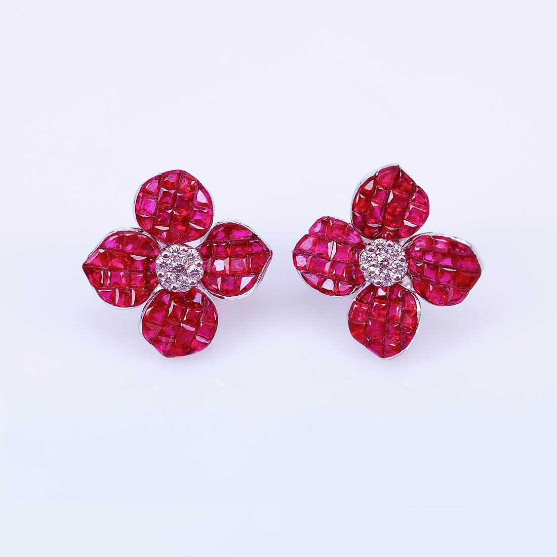 The top quality ruby which make in invisible setting. We set the stone in perfection as we are professional in this kind of setting more than 40 years. The invisible is a highly technique .We cut and groove every stone .Therefore; we can guarantee