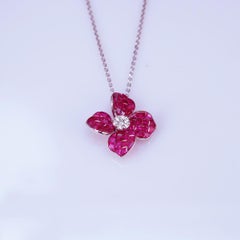 18 Carat White Gold Flower Ruby and Diamond Invisible Pendant