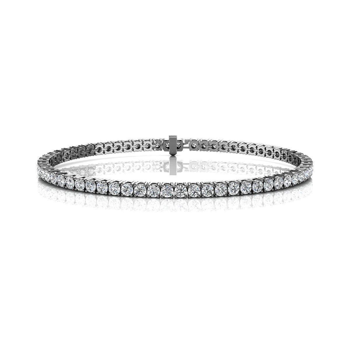 A timeless four prongs diamonds tennis bracelet. Experience the Difference!

Product details: 

Center Gemstone Type: NATURAL DIAMOND
Center Gemstone Color: WHITE
Center Gemstone Shape: ROUND
Center Diamond Carat Weight: 4
Metal: 18K White