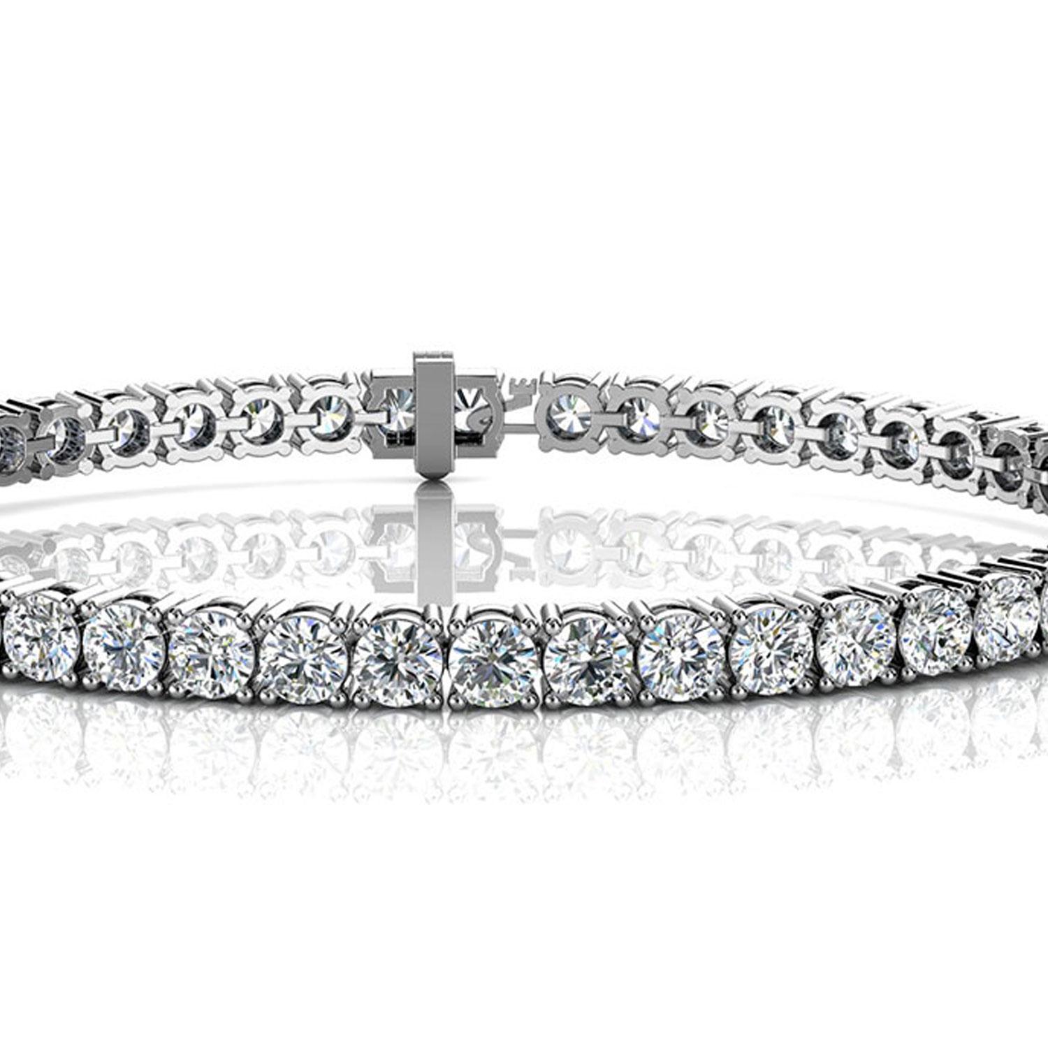 A timeless four prongs diamonds tennis bracelet. Experience the Difference!

Product details: 

Center Gemstone Type: NATURAL DIAMOND
Center Gemstone Color: WHITE
Center Gemstone Shape: ROUND
Center Diamond Carat Weight: 7
Metal: 18K White