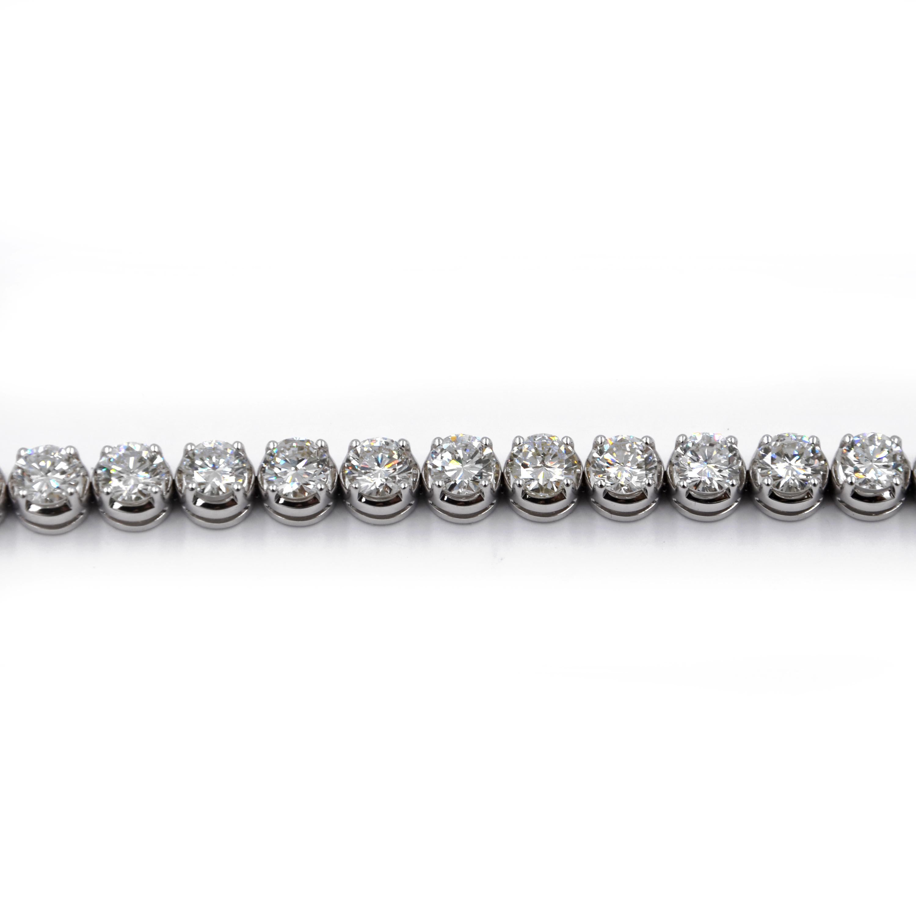18KT White Gold GARAVELLI DIAMOND TENNIS BRACELET 
This gorgeous bracelet is hand-made in Italy and has been made to celebrate our company's 100 years anniversary
It features 27 diamonds color  I-J-K clarity VVS-VS     Certificate IGI 44765 and ACG