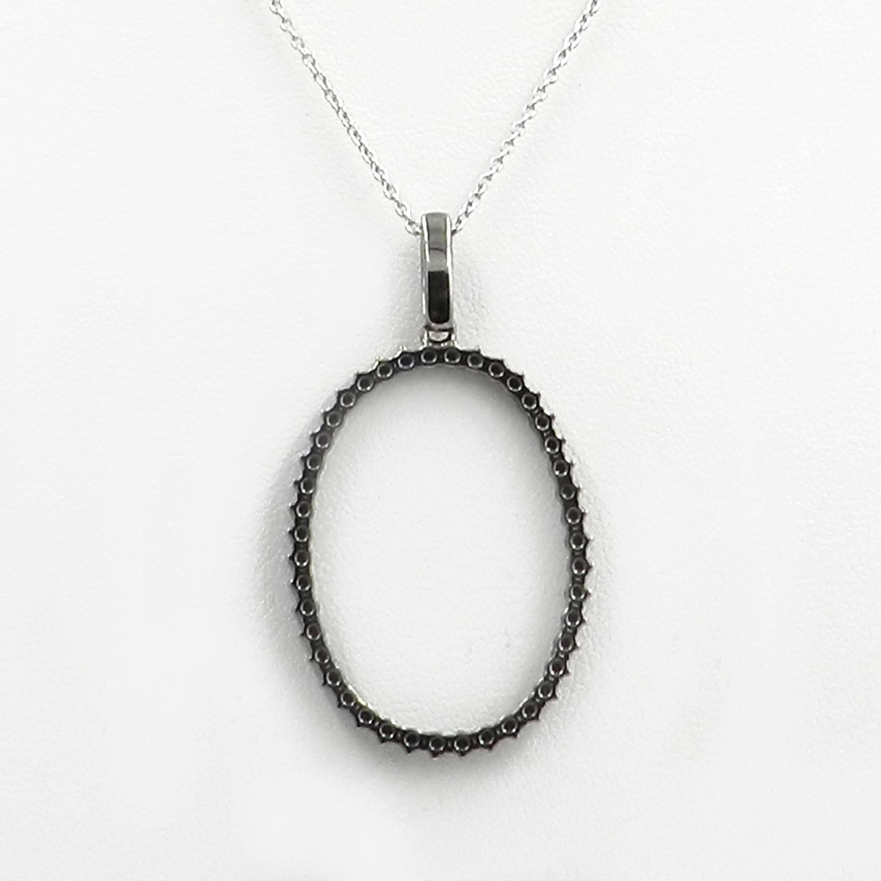 18KT White Gold GARAVELLI NECKLACE with BLACK DIAMONDS 
Oval black diamonds element on a white gold chain with two black diamonds on each side. Chain lenght 46 cm (18 inches)
GOLD gr : 8,68
BLACK DIAMONDS ct : 2,15