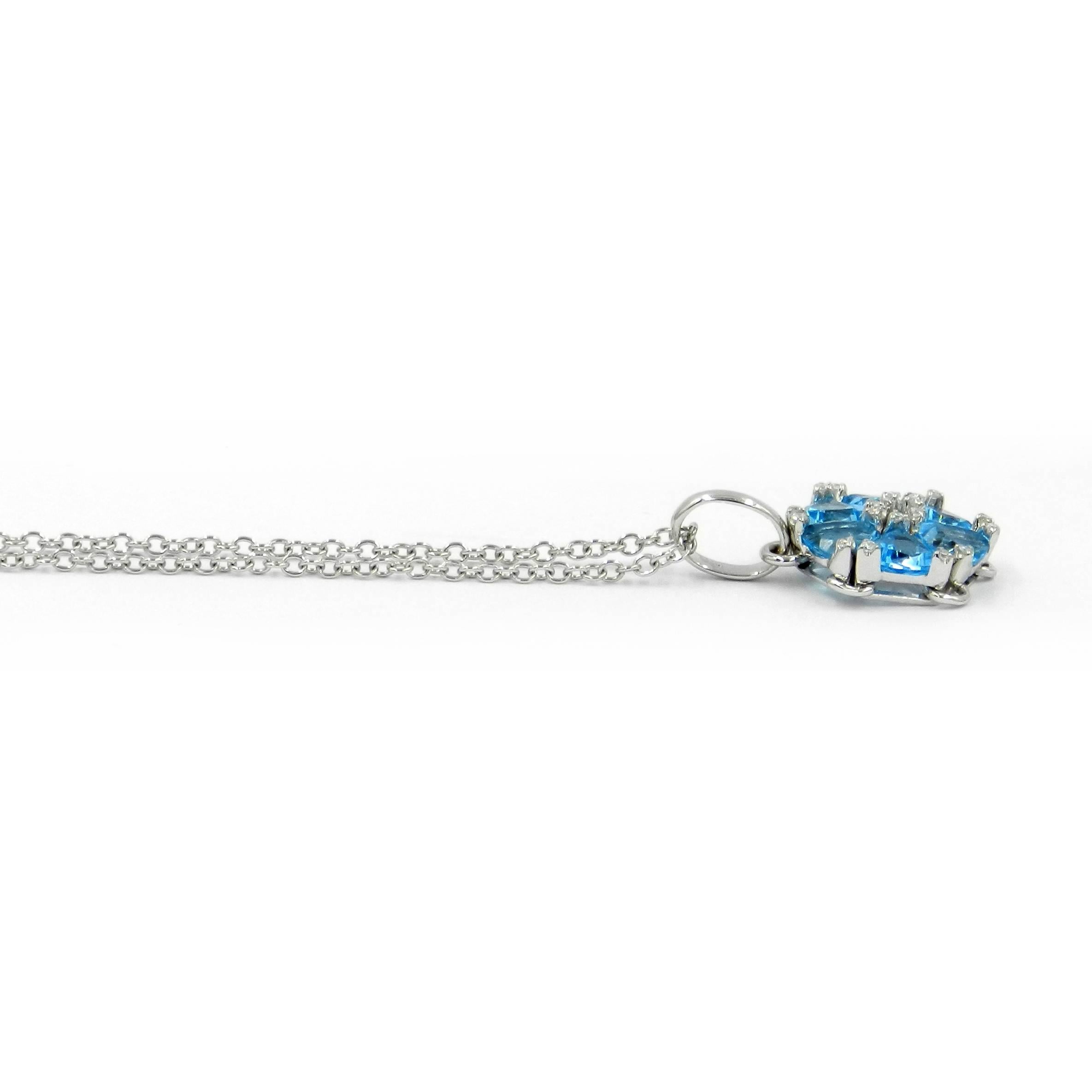 18KT White Gold GARAVELLI Pendant with Chain and BLUE TOPAZ and DIAMONDS 

GOLD  : 5,28
DIAMONDS ct : 0,09
Natural Blue Topaz total weight ct : 2,80