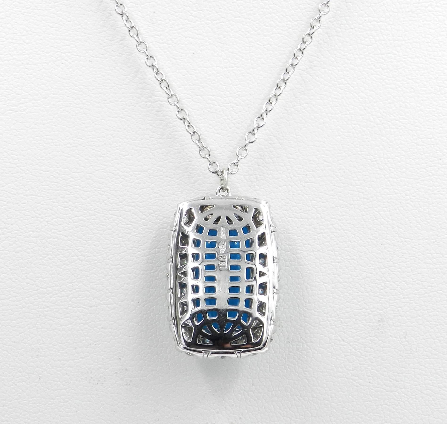 18KT White Gold GARAVELLI Pendant With Chain With DIAMONDS & TURQUOISE
The pendant measures MM.17x25
18 kt GOLD  :grs 8
DIAMONDS ct : 1,25
SEMIPRECIOUS Natural Turquoise ct : 8,40

