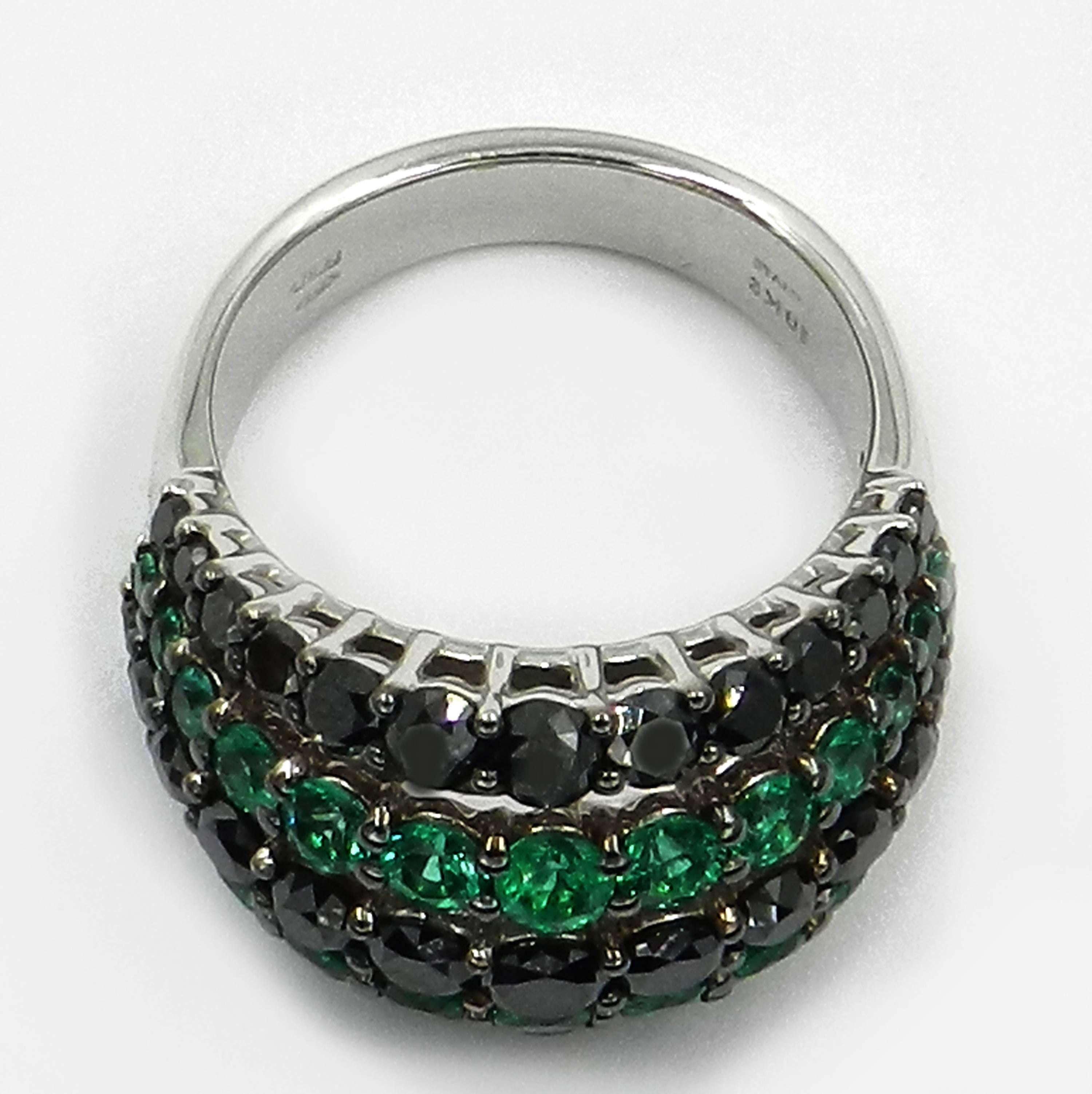 Women's or Men's 18 Karat White Gold Garavelli Ring with Black Diamonds and Emeralds For Sale