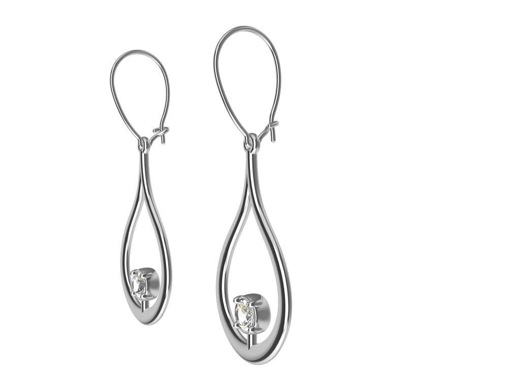 18 Karat White Gold GIA Diamond Teardrop Earrings, This is the latest  from the Teardrop Series.  Teardrops for inspiration? Yes water is one of the elements that I use for design. The shape of tears is rather elegant add a diamond or two and there