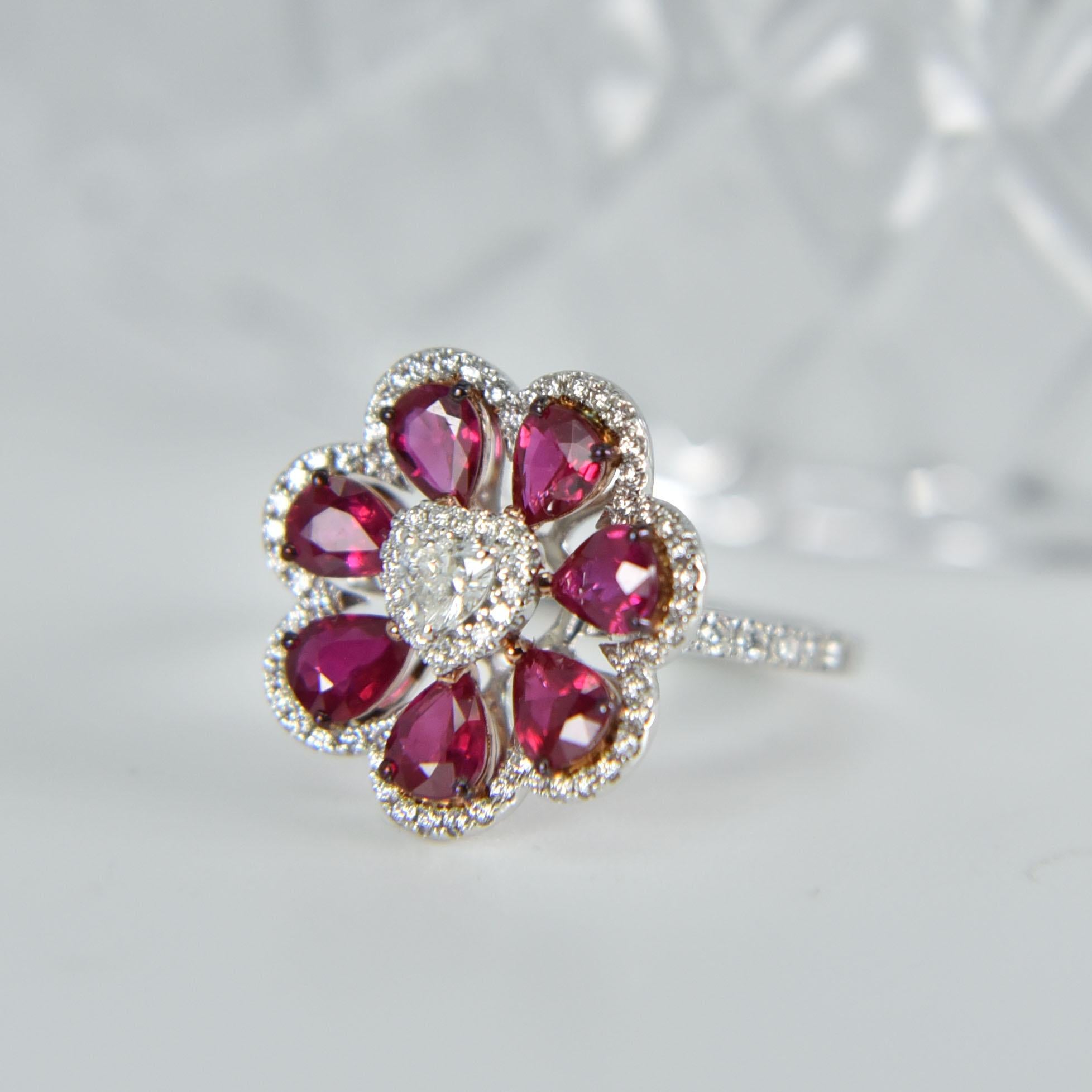 Pear Cut 18 Karat White Gold Gilin Ruby and Diamond Flower Cocktail Ring For Sale