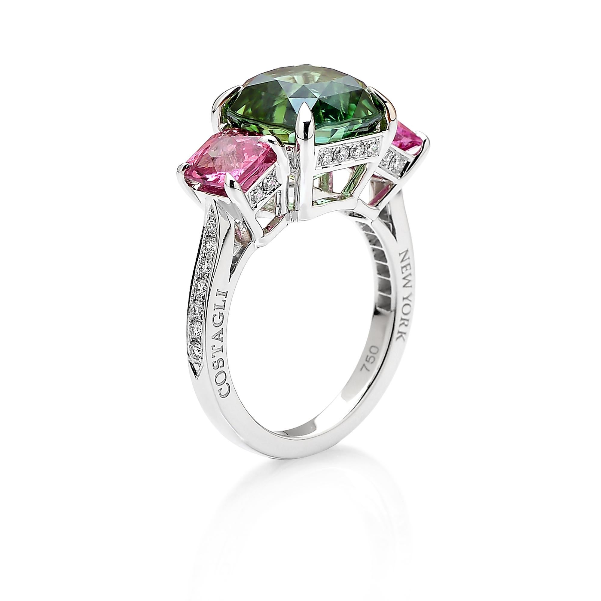 One of a kind cushion-shape green tourmaline ring with cushion-shape pink tourmaline side stones set in 18kt white gold with pave-set round, brilliant diamond detailing.

A classic ring silhouette paired with the unique color combination of the