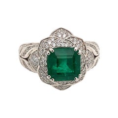 18 Karat White Gold Green Emerald and Diamond Ring