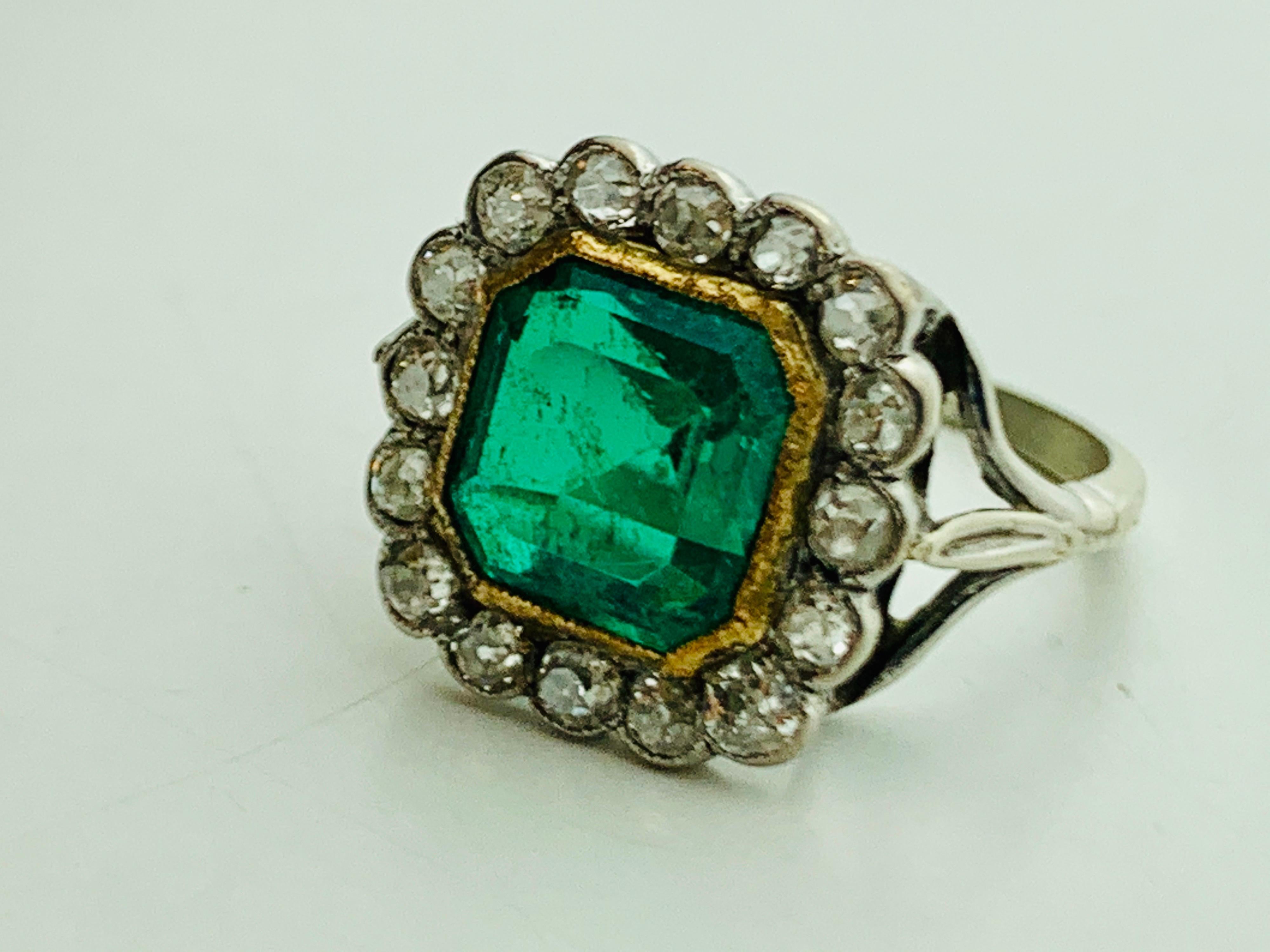 Antique 18 Karat White Gold Coktail Ring With A Large Quality 3 Carat Green Zambian Emerald & Brilliant Old Cut White Cut Pavé Set Diamonds Approximately 1 Carat. Period Circa 1940. English. Original Condition And Will Be Polished Prior to Sending.