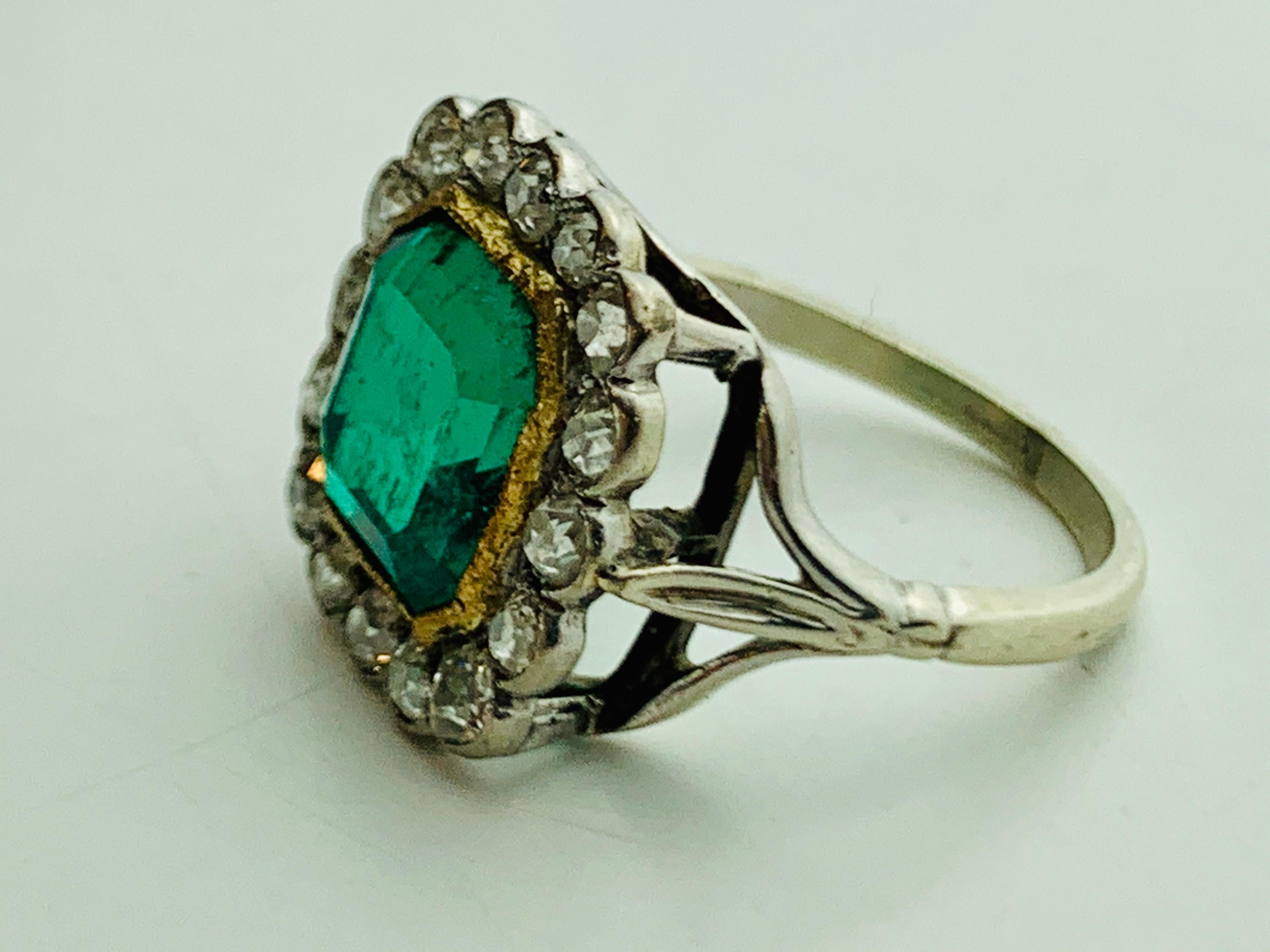 18 carat gold emerald and diamond ring