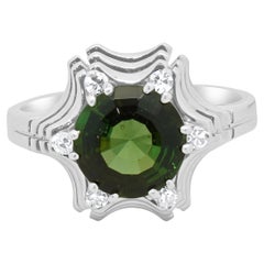 Anello con tormalina verde e diamanti in oro bianco 18 carati