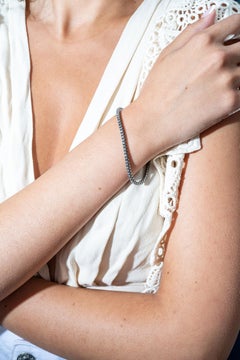 Bracelet tennis en or blanc 18 carats avec diamants gris