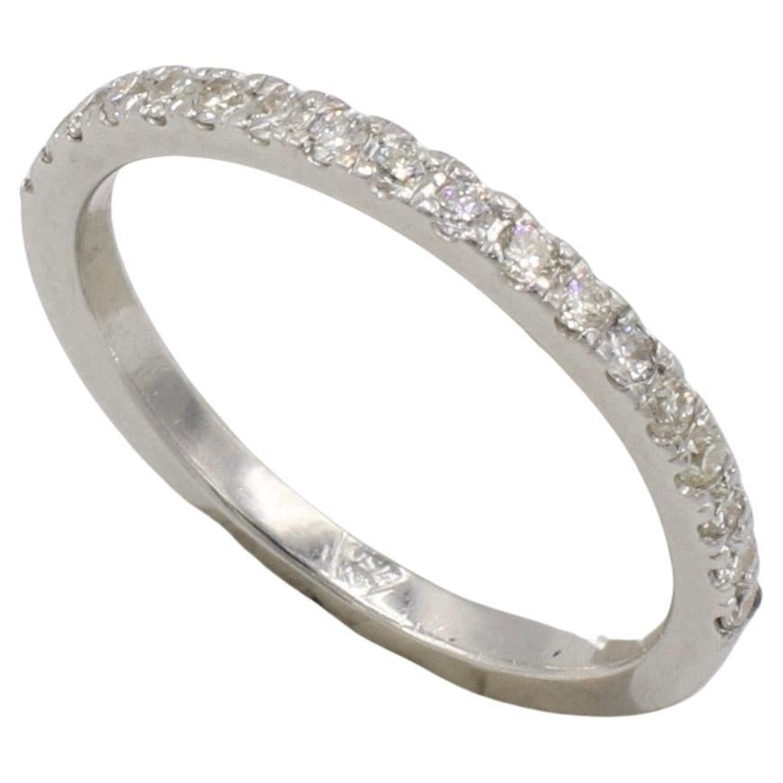 18 Karat White Gold Half Round Natural Diamond Wedding Band Ring 
Metal: 18k white gold
Weight: 2.09 grams
Diamonds: Approx. .20 CTW G-H VS round natural diamonds
Width: 1.8mm
Size: 6 (US)
