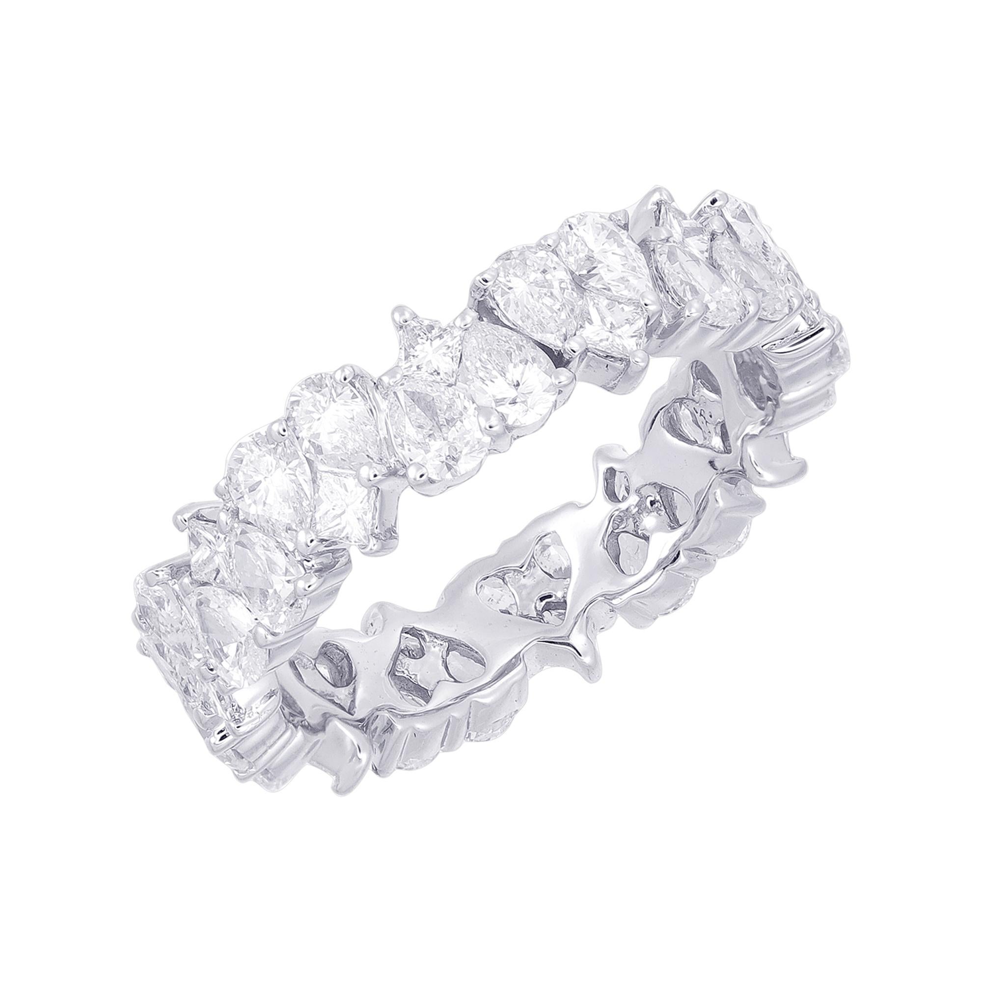 This exquisite and extremely unusual diamond eternity band is crafted in 18k white gold. It is a continuous circle of Heart shape diamond Illusion weighing band approx. 2.86 carats. It can be showcased as the perfect wedding ring or diamond