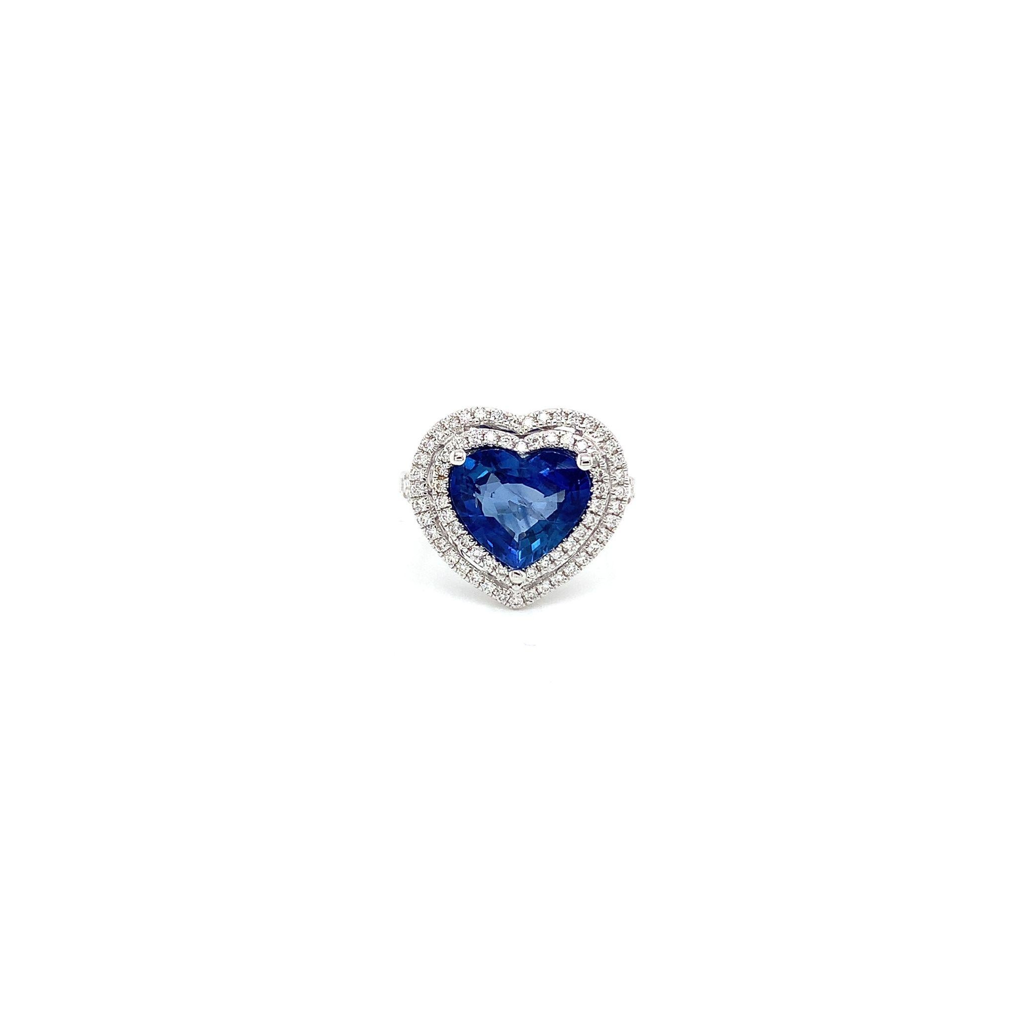 Certified 3.58 ct heart shape Ceylon Sapphire
Measuring (9.44x10.92) mm
99 pieces of round diamonds weighing .51 cts
Set in 18K white gold ring
weighing 5.27 grams