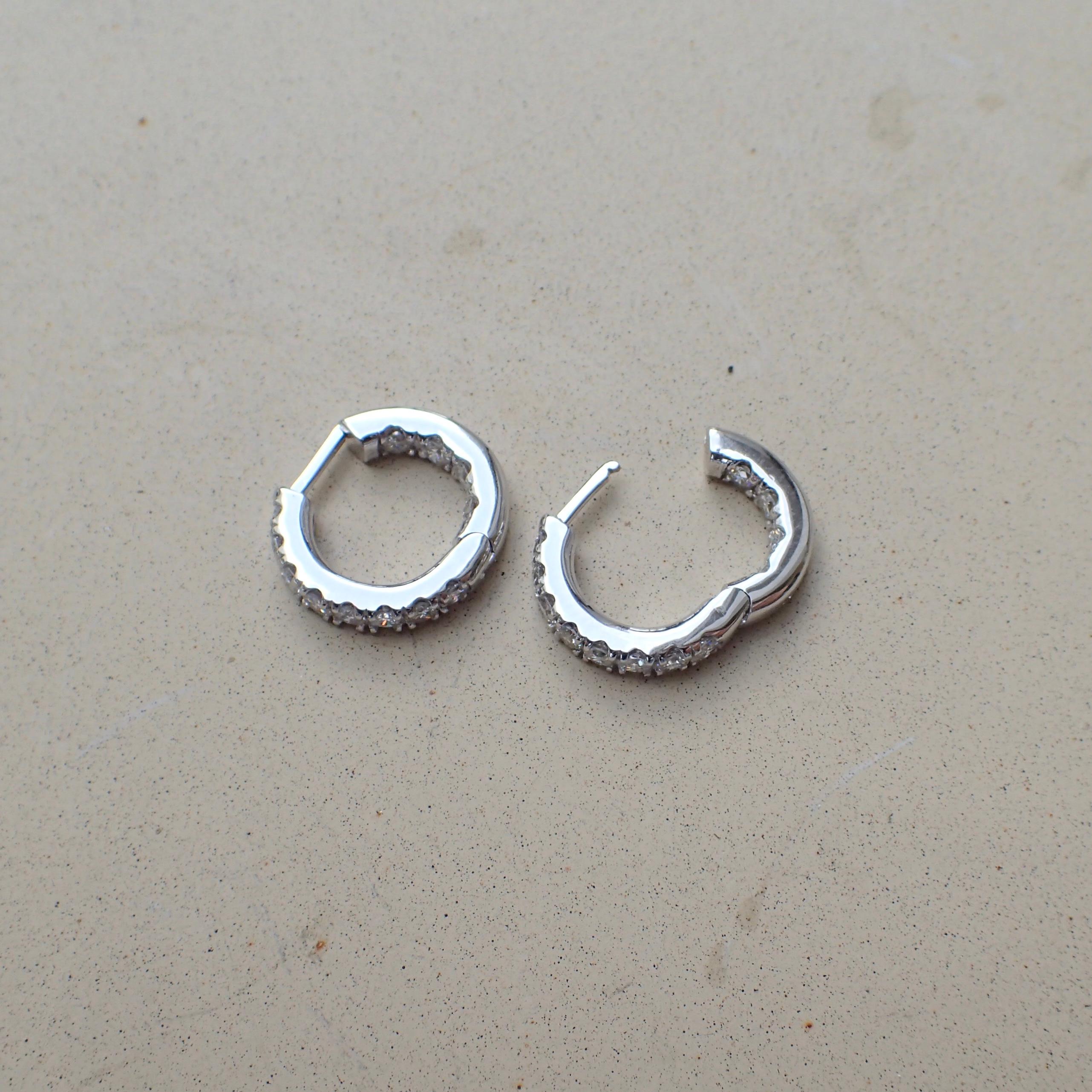Contemporary 18 Karat White Gold Hoop Earrings are Set with 1.18 Carat of Diamond For Sale