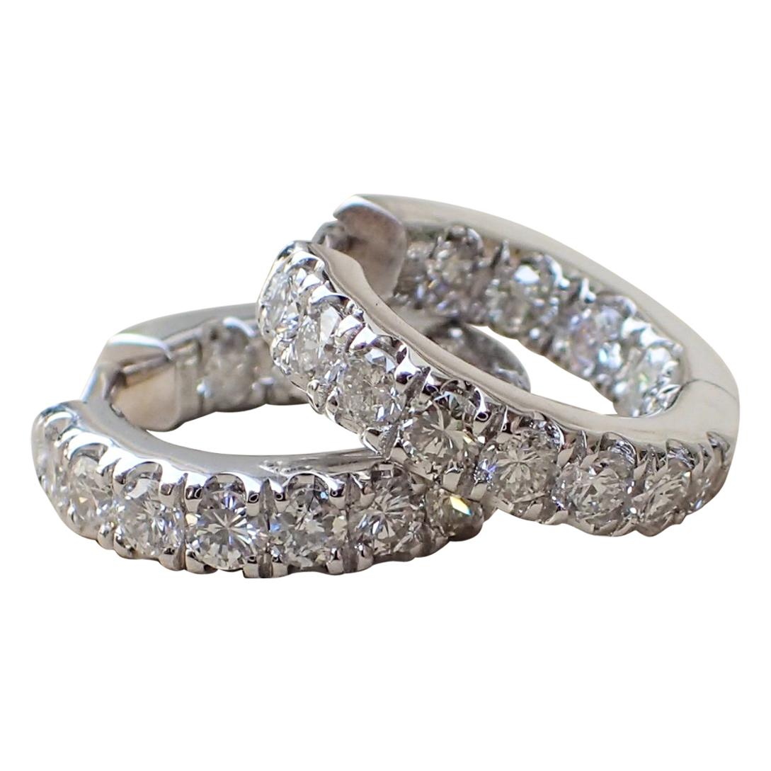 18 Karat White Gold Hoop Earrings are Set with 1.18 Carat of Diamond For Sale